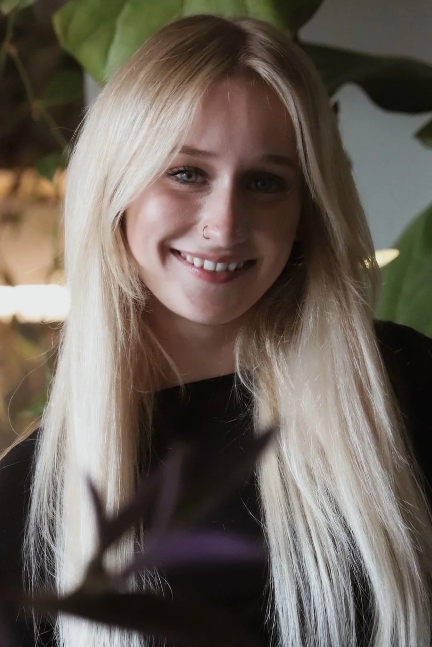 Blonde girl, long hair, smile