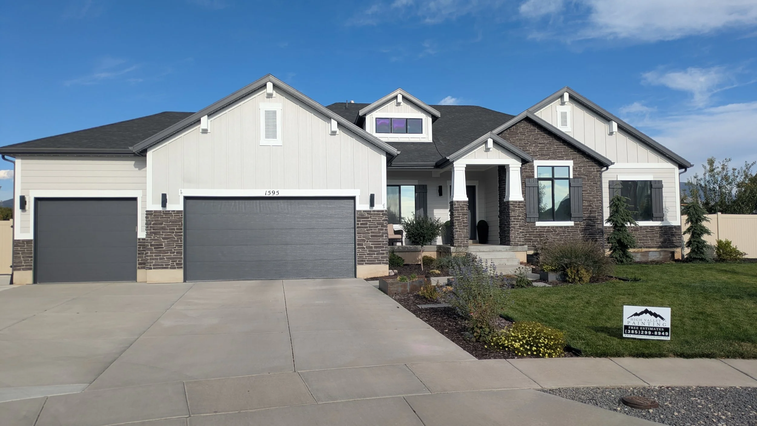 Freshly painted home exterior in Utah, showcasing vibrant colors and professional exterior painting.