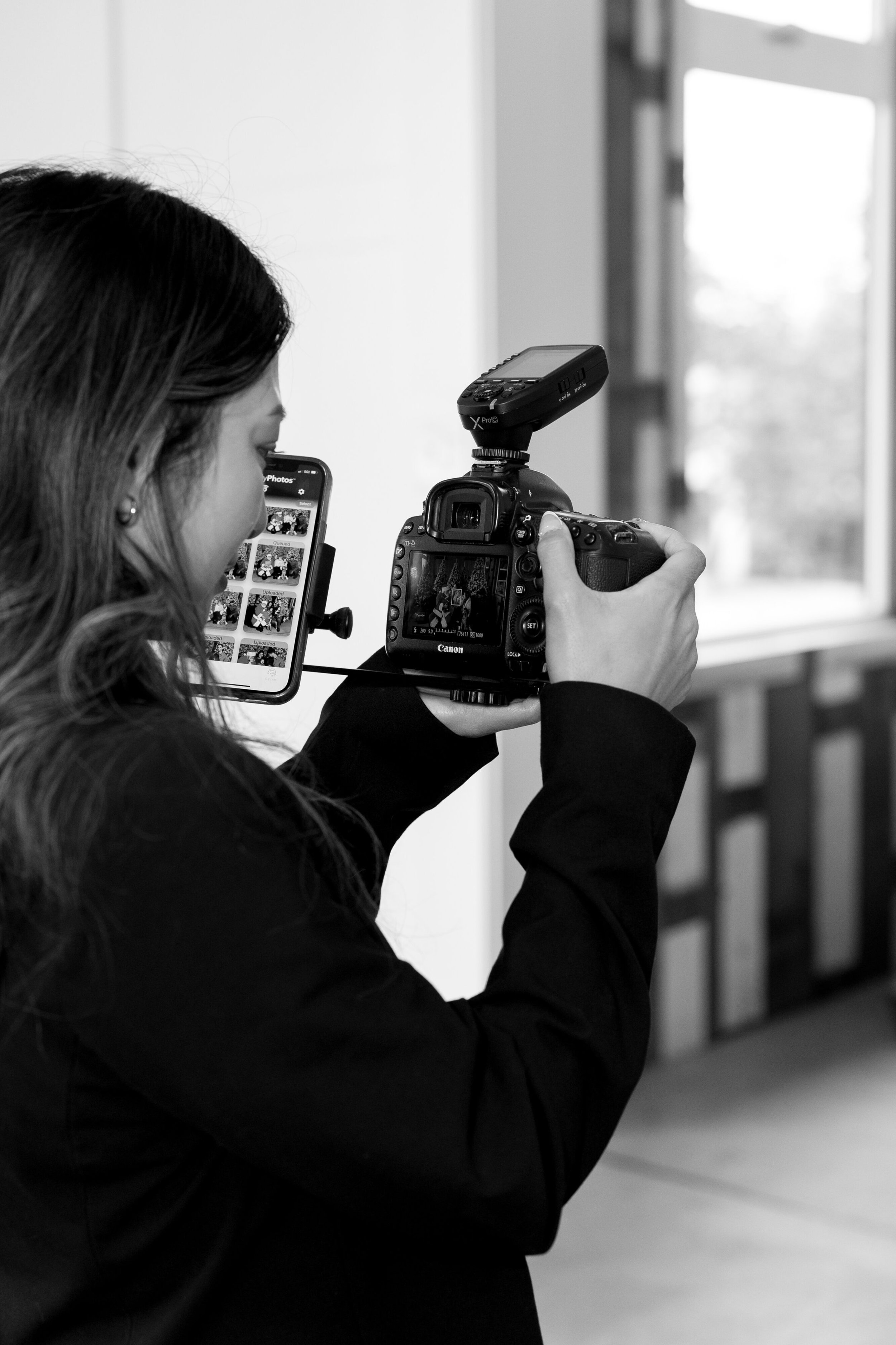 photographer taking editorial photo in a studio setting at an event.