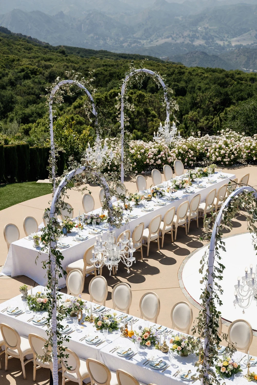 Reception with greenery chandeliers at Stone Mountain Estate, Malibu