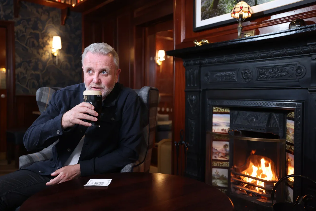 Michael sipping Guinness