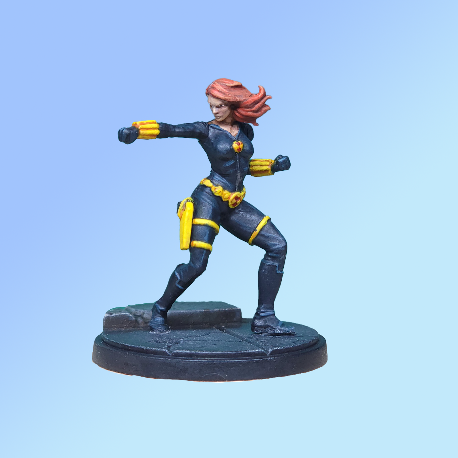 A miniature of Black Widow from Marvel Crisis Protocol