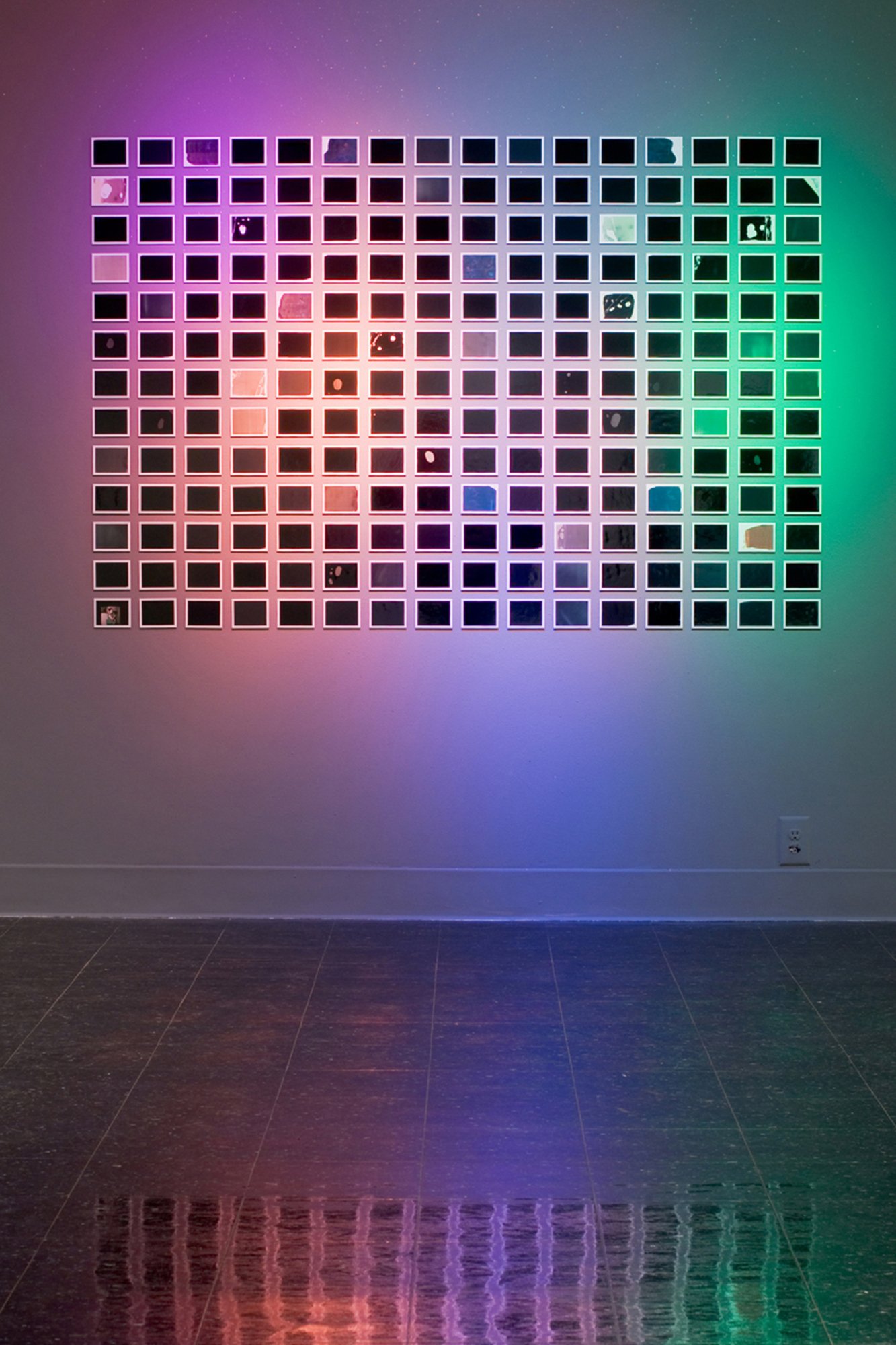 Installation view: Polaroids, lights, gel, glitter, paint