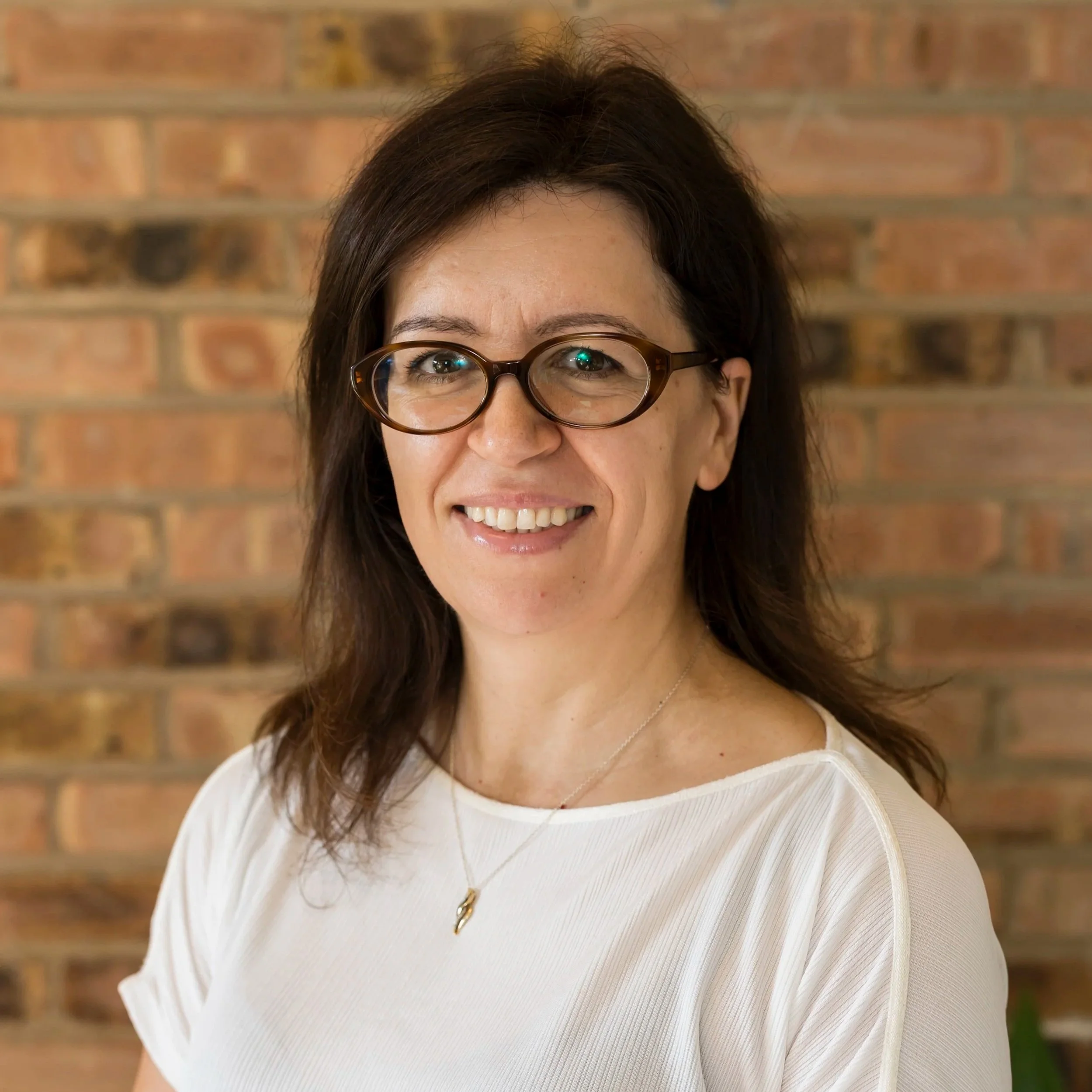 A headshot of Aniela Muka.