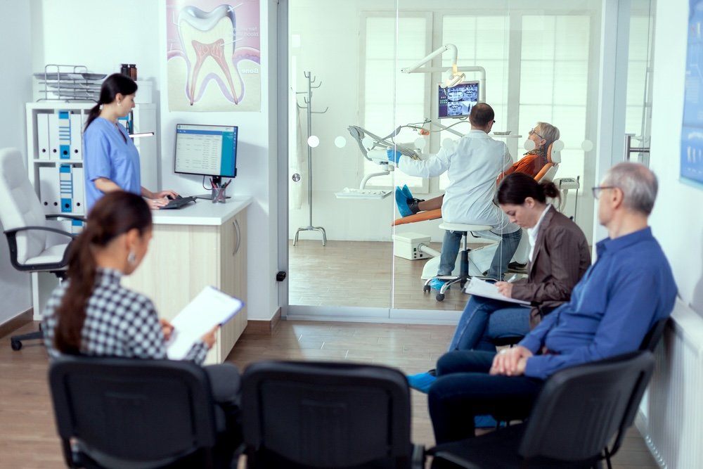 Crowded clinic waiting area needing cleaning services in Orange County