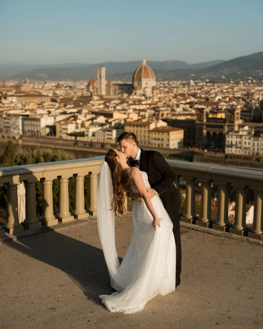 A&amp;K 🤍
In the crisp morning air, their love glowed warmer than the first rays of sun painting Florence awake beneath us.
No better spot in the world &mdash; quiet corners of timeless romance, overlooking the historic city awakening in soft golden