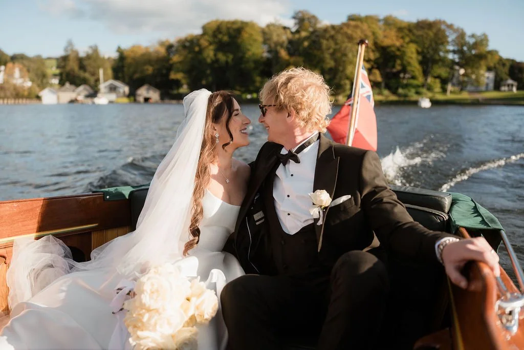 intimate Storrs Hall wedding couple on Lake Windermere private boat ride at golden hour