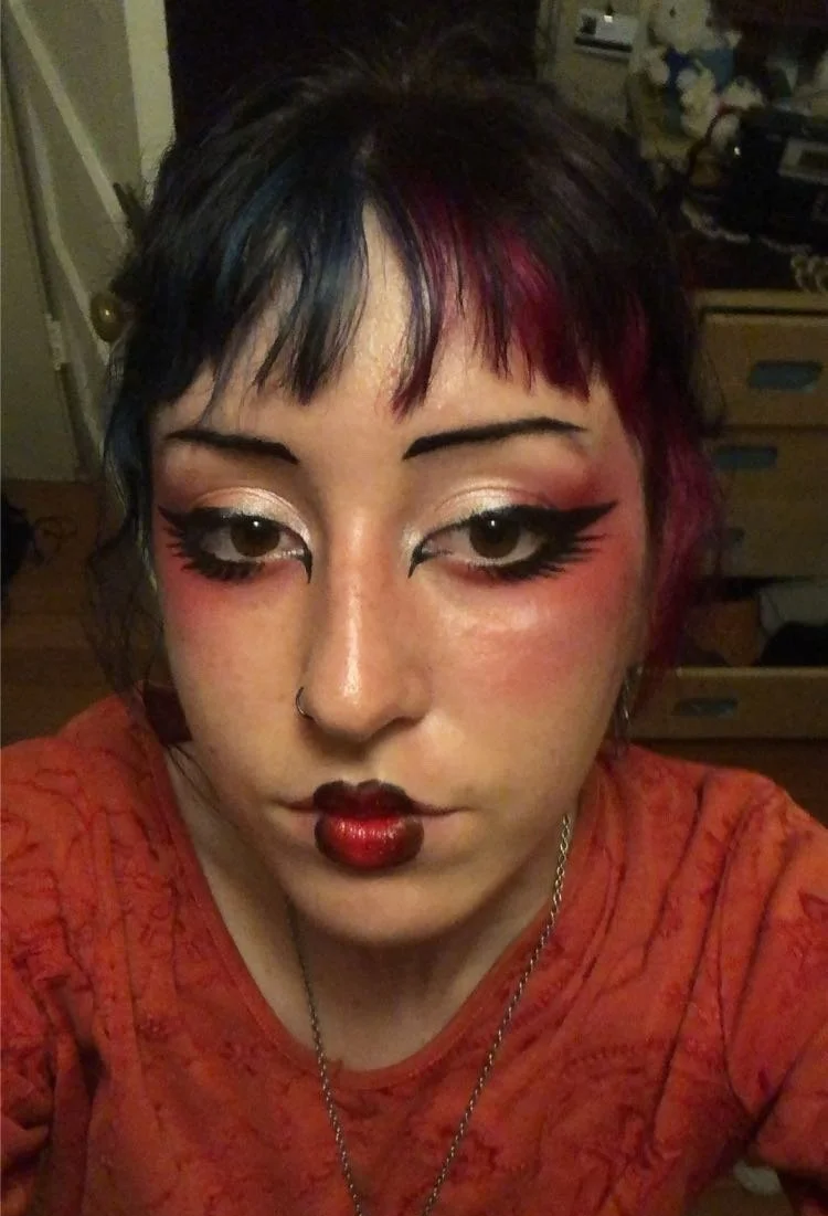 Red and black, feathered eyeliner
