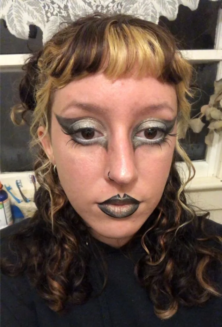 Silver and black big liner and matching lips