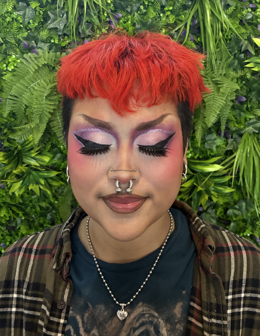 Purple, glittery, stage makeup