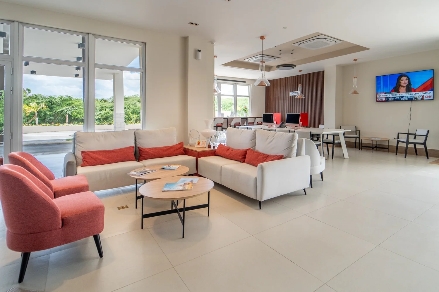 Hotel lobby seating and shared spaces at Super 8 Manzanillo