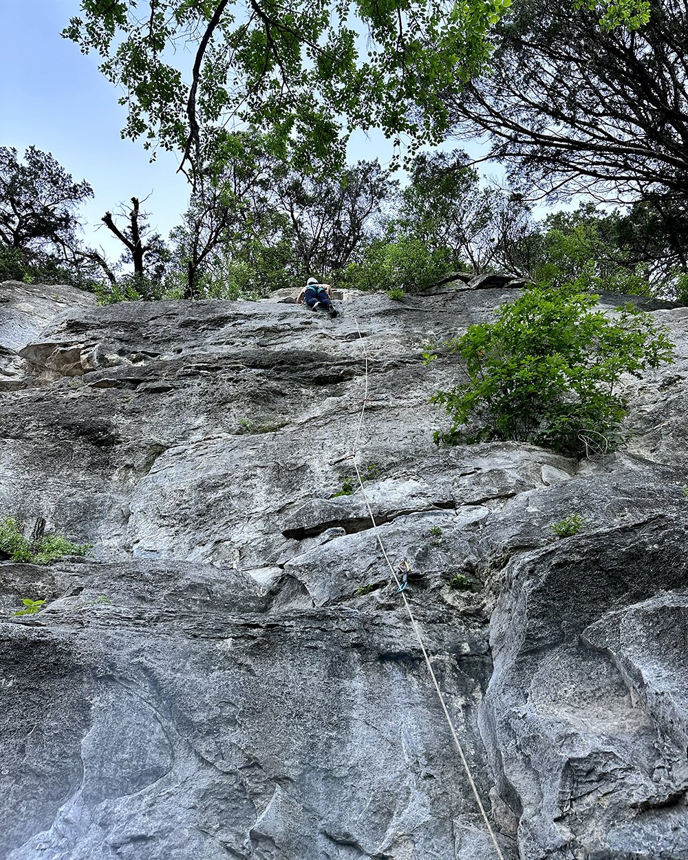  Leading Trojan 5.9, figuring out the crux at the top. 