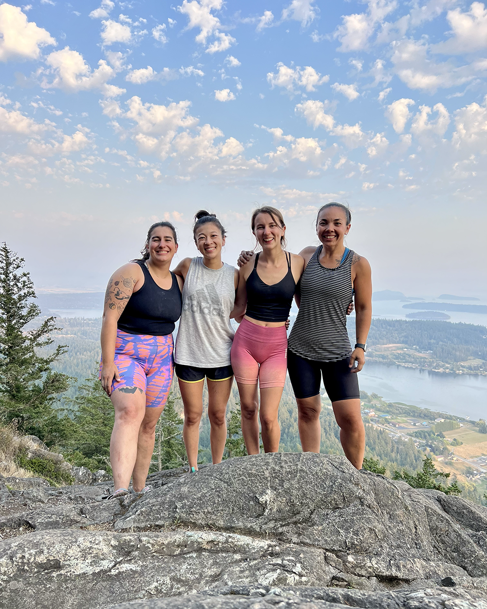  Alexis, Mica, Jenny, and me cheesing on the top of Mt. Erie in Anacortes.  