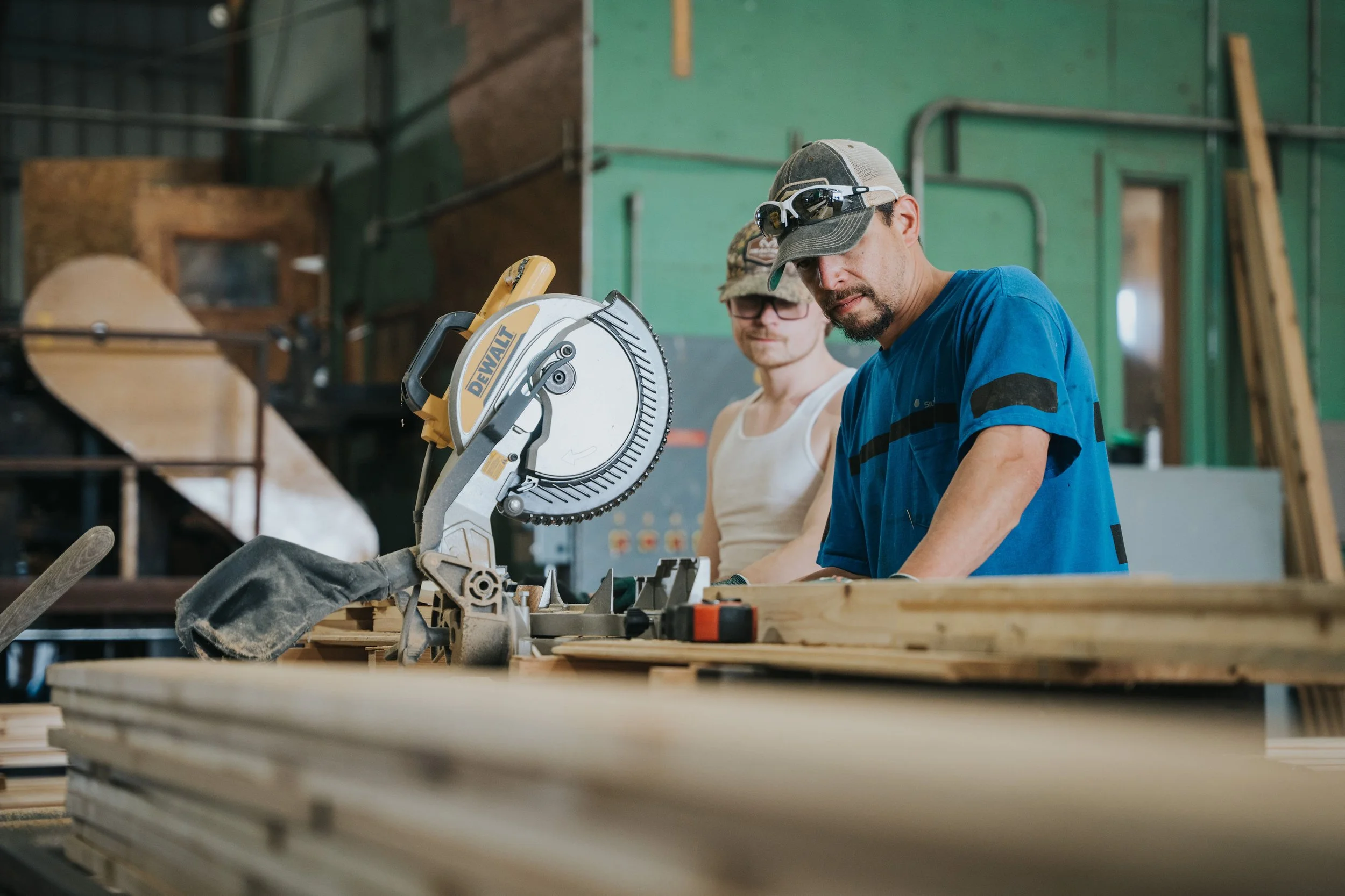 West Bay Mill Staff trimming cedar lumber