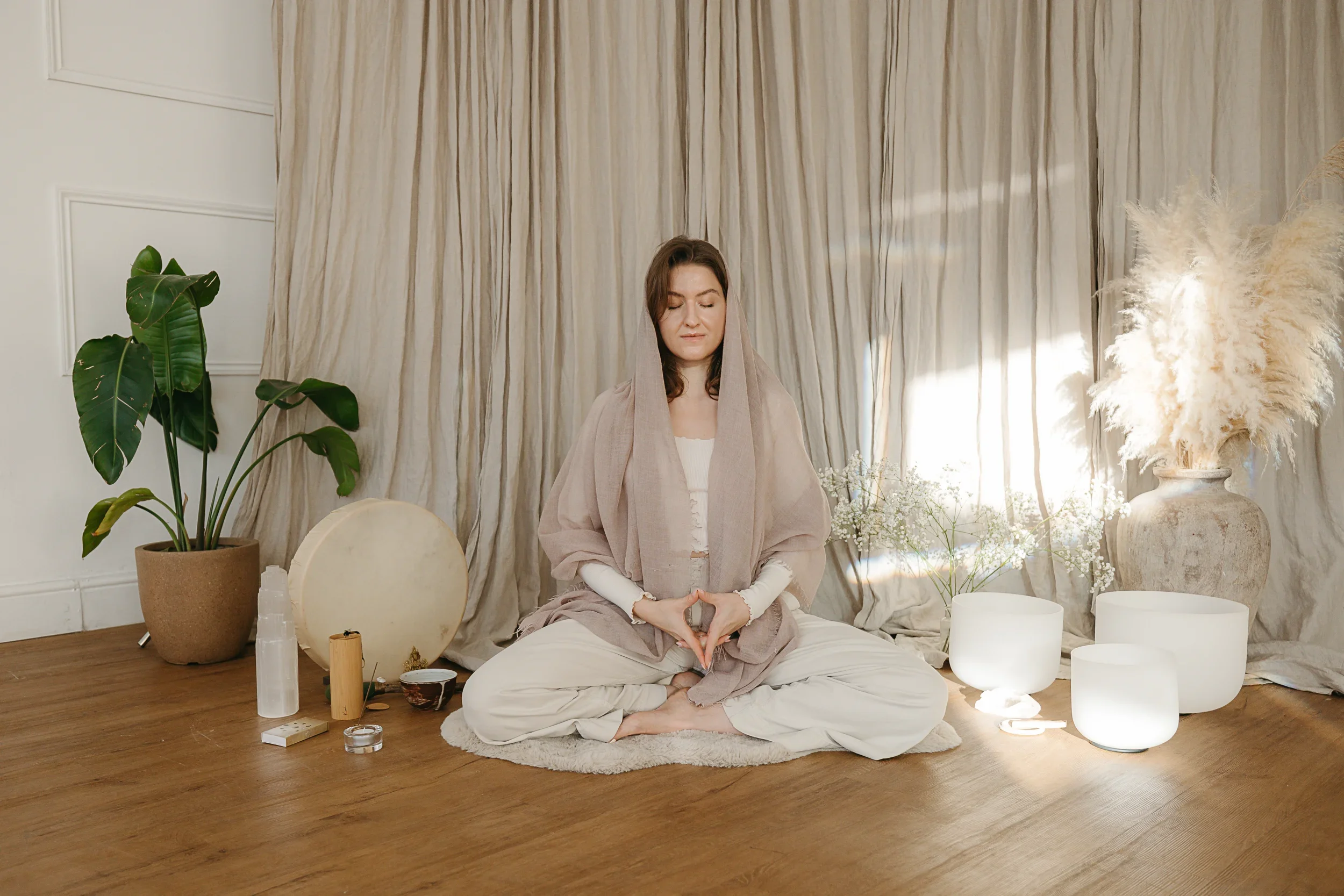 Nina Yiflow doing a yoni mudra in seated meditation