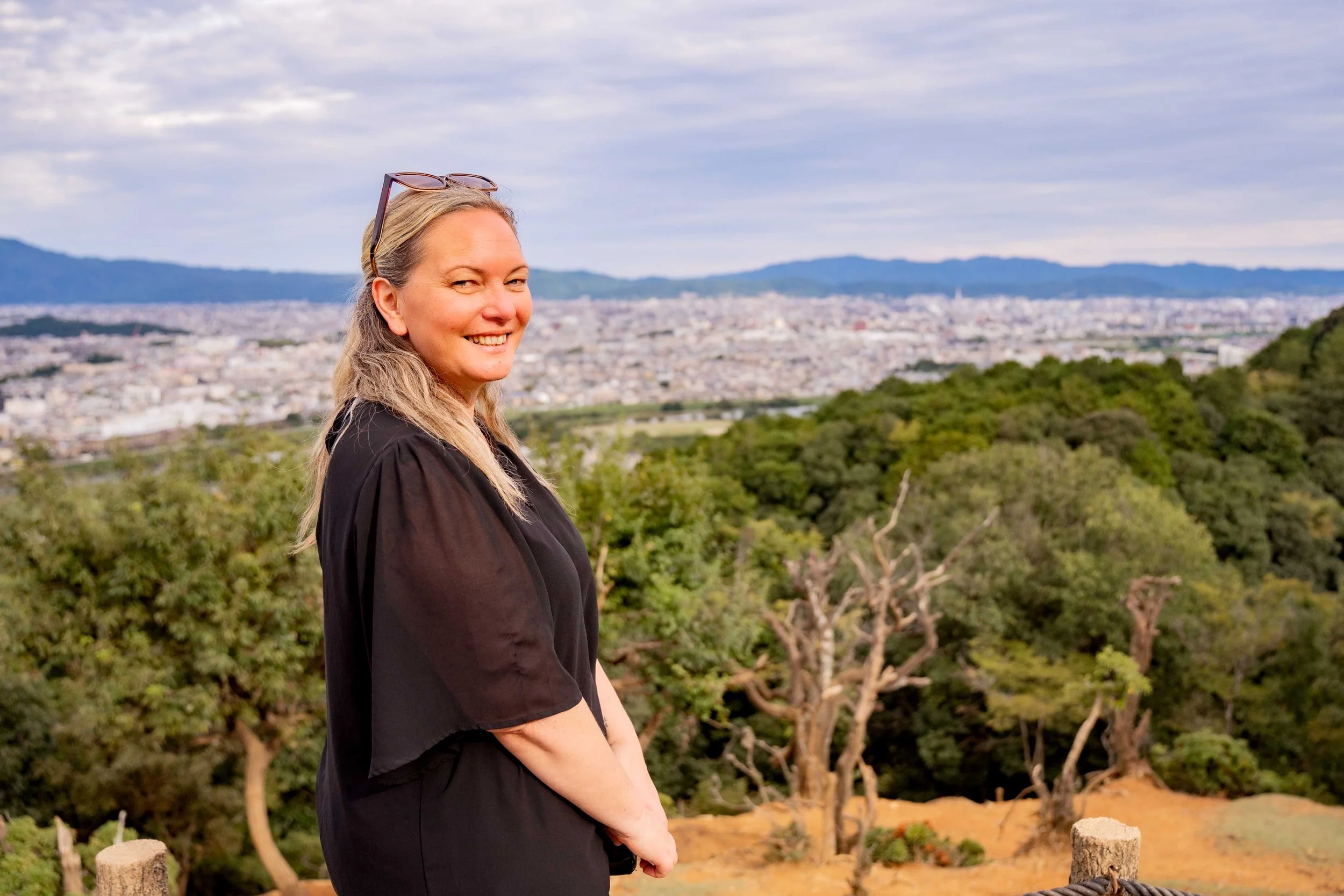 woman empowerment and boudoir photographer in Manukau South Auckland ready to take your empowering photographs, offering hair and make up