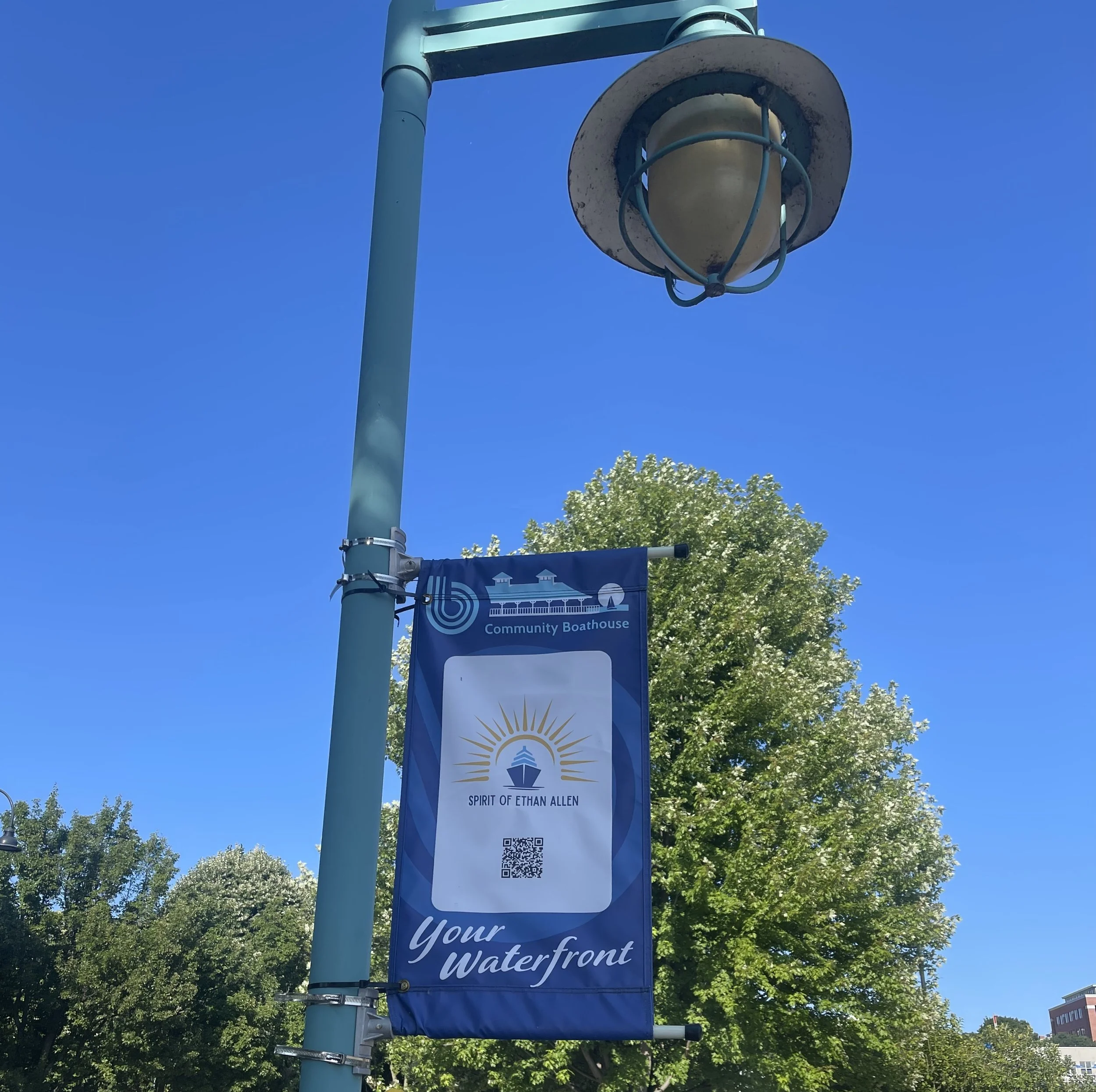 Sponsored waterfront banners incorporating the boathouse illustration