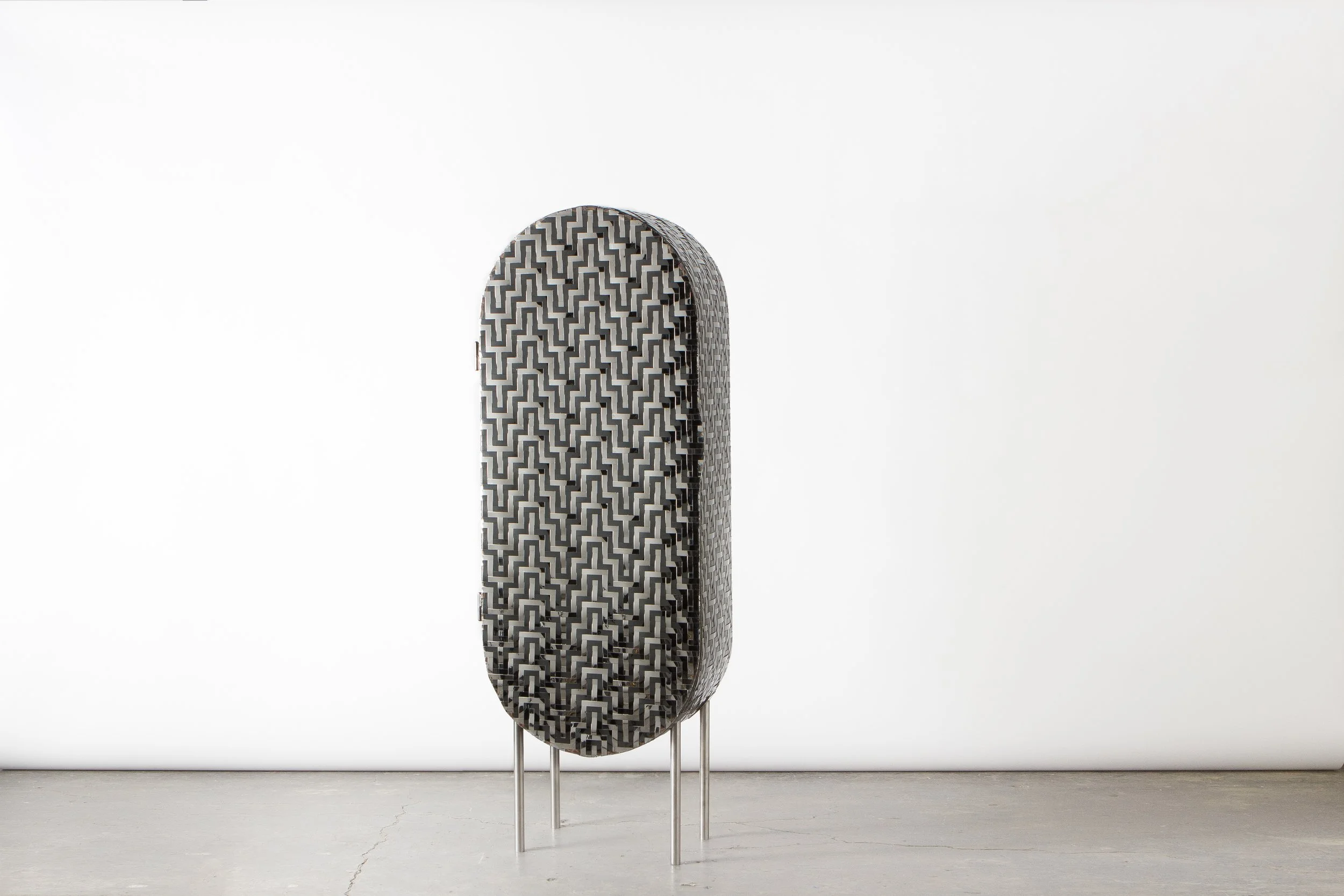 Michael_Gittings_handmade-woven-stainlesssteel-cabinet-NGV-collection.jpg