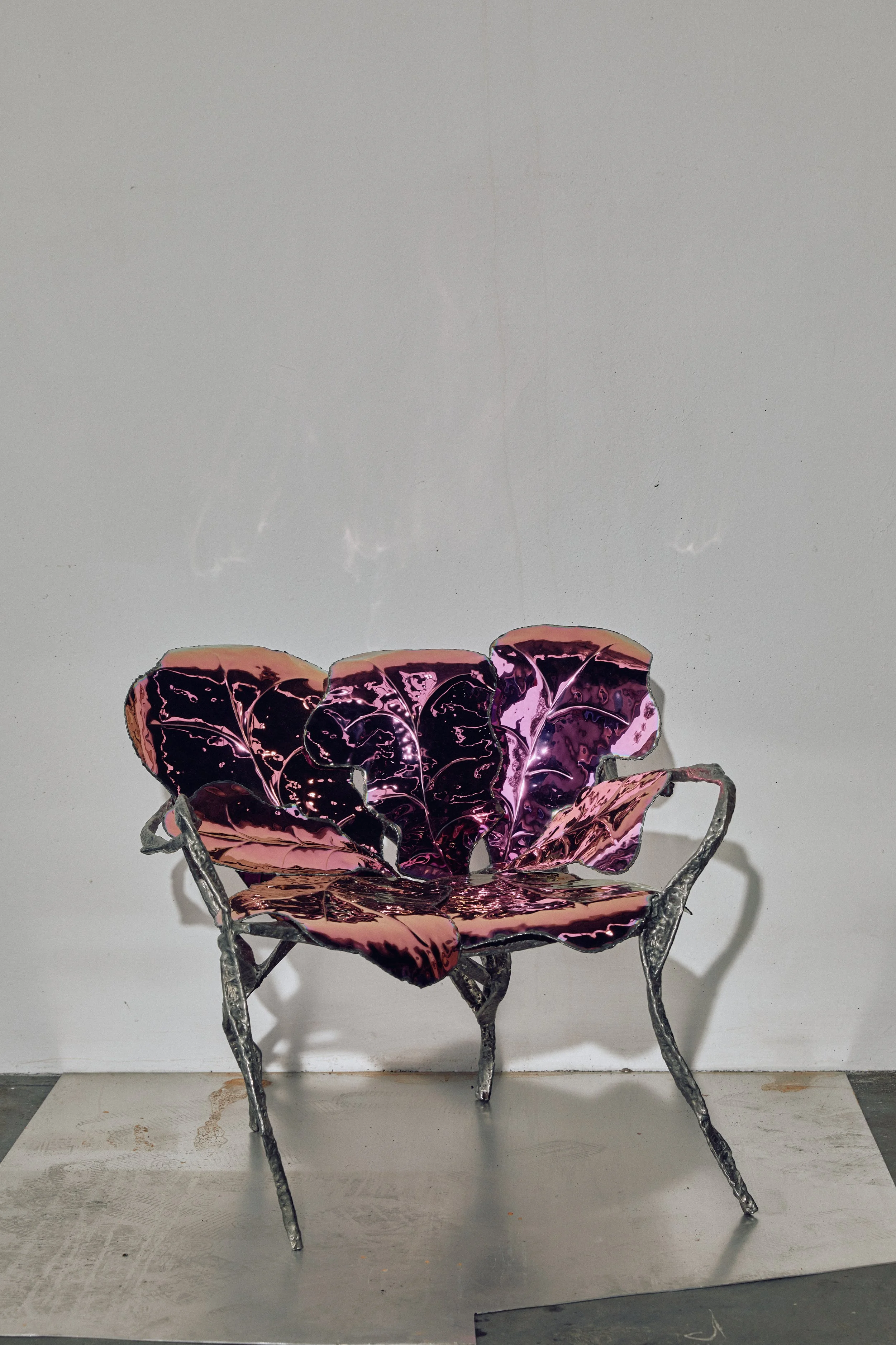 Michael_Gittings_hand-fabricated-mirror-polished-stainless-steel-pink-flower-chair.jpg
