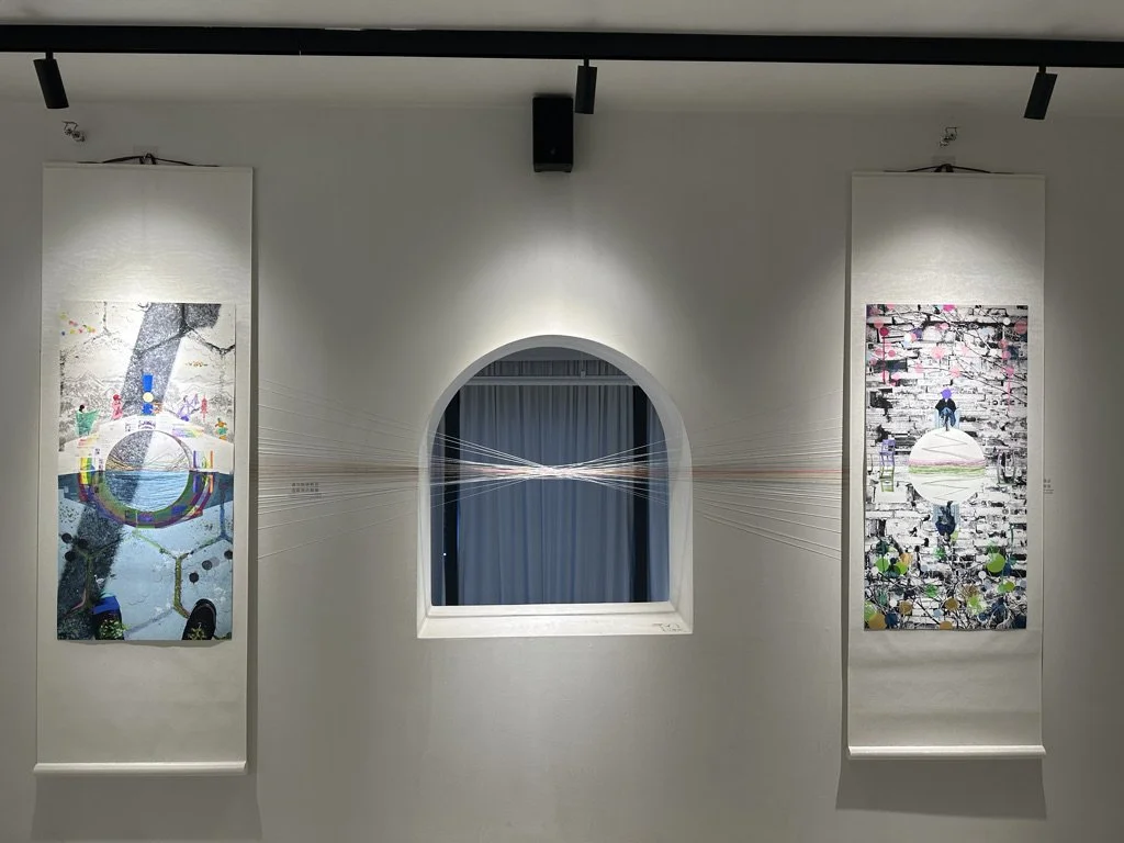 Bilby's work featured an installation of silk thread connecting the two works.