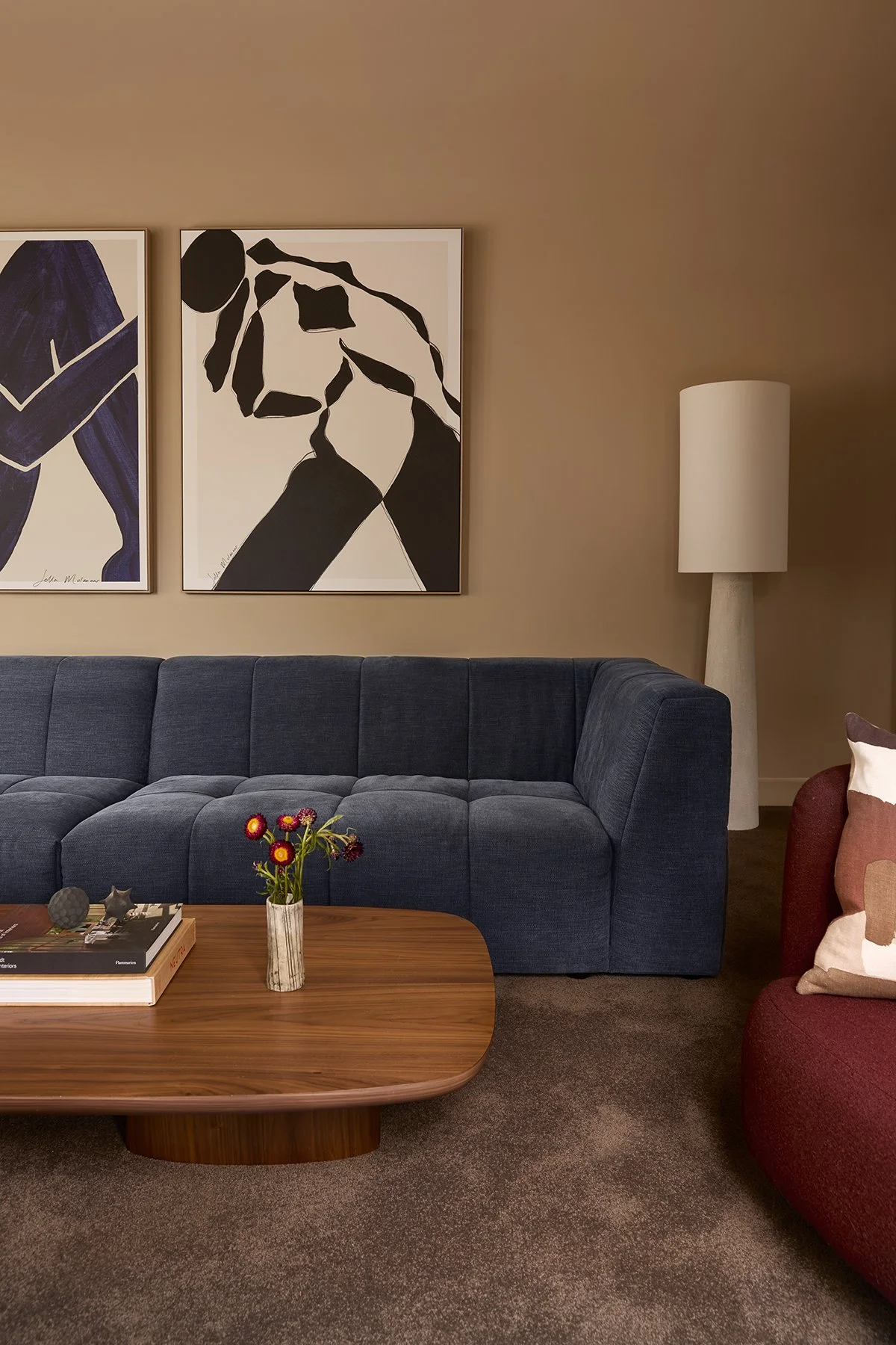 Living room blue sofa and artwork