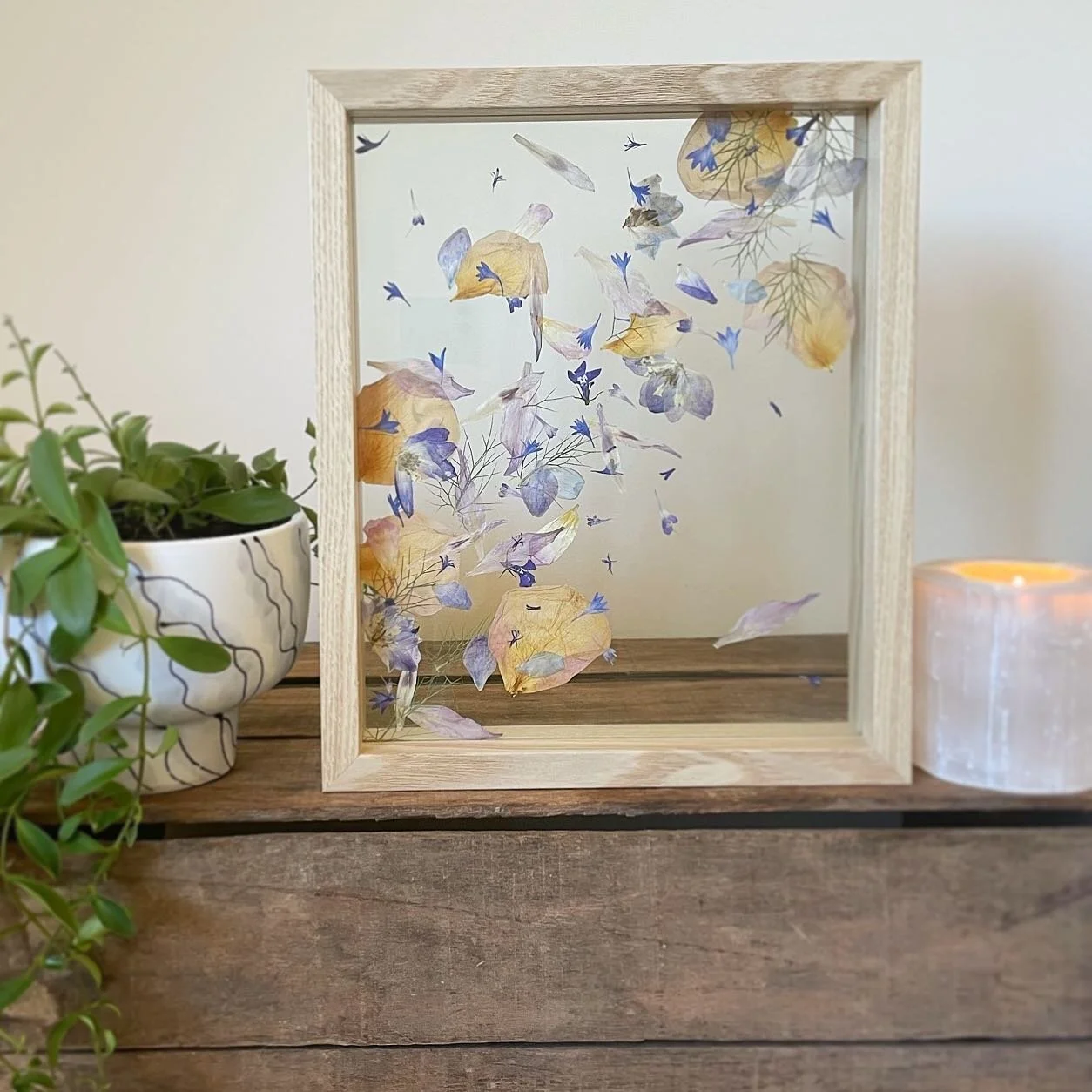 This large gladioli floating frame makes me think &lsquo;ephemeral&rsquo;, even though the artwork will last a much longer time than a bouquet would. I think it&rsquo;s the way the petals look like they&rsquo;re caught in a breeze blowing them to far
