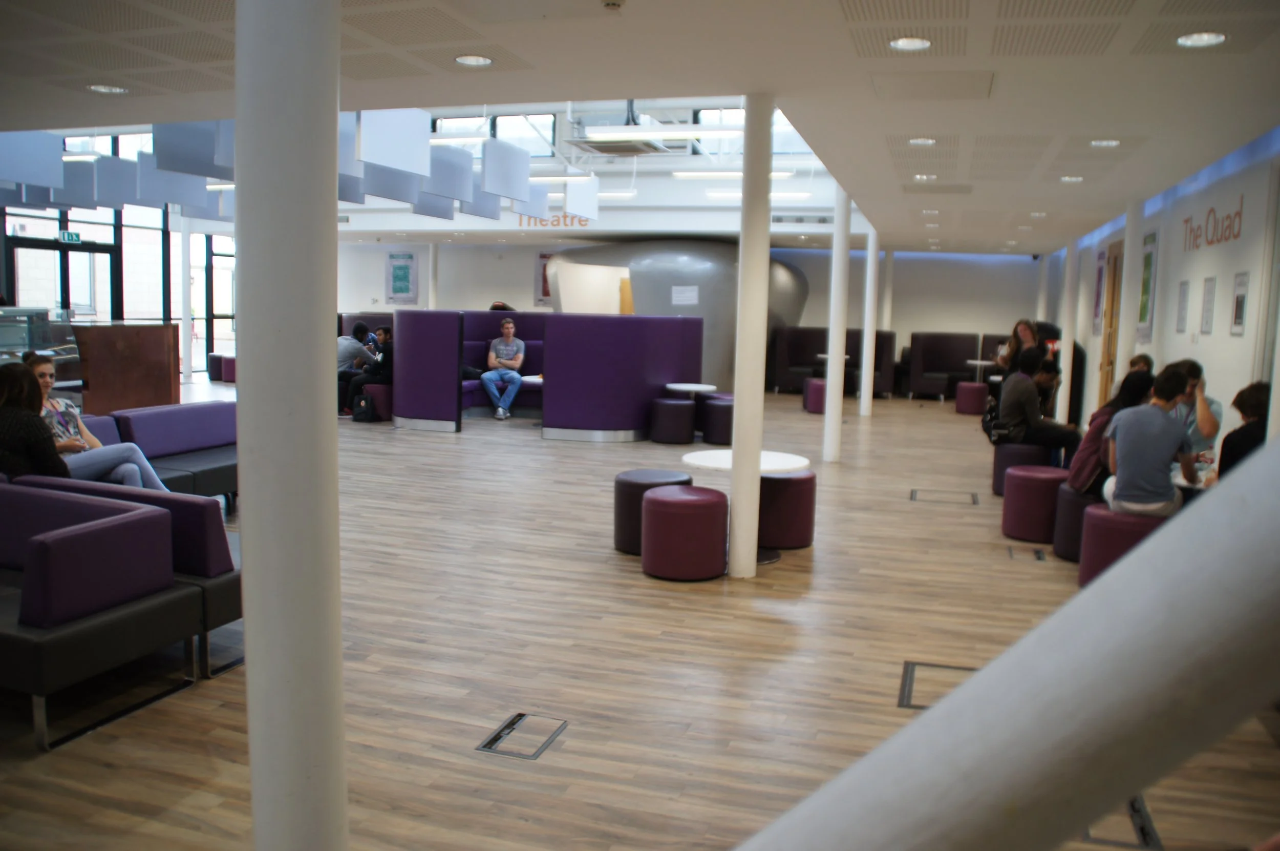 hall space with sofas and seats