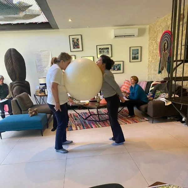 two women doing an ACT activity during an Athara adventure trip