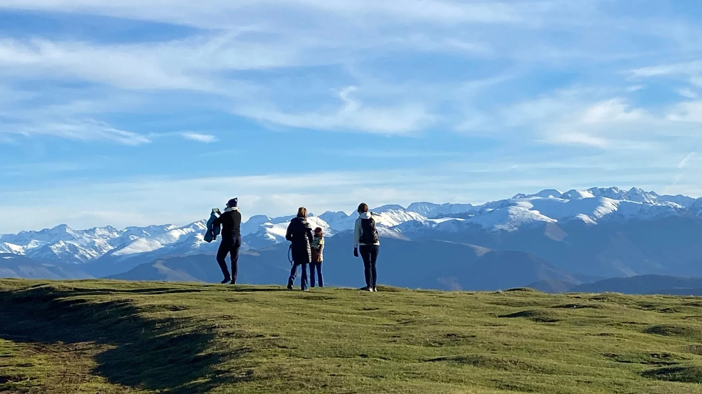 four women on a mountain top during an Athara adventure trip