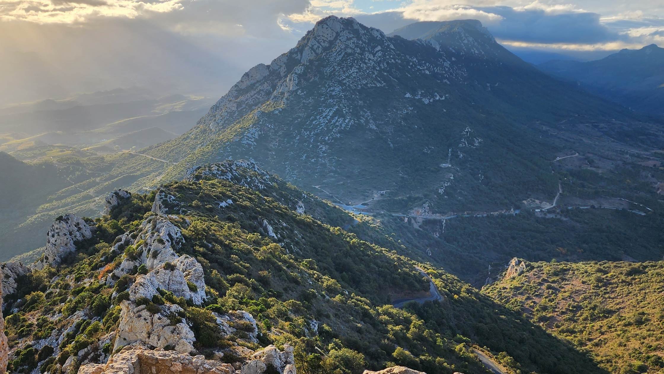Mountain landscape in Europe at golden hour, setting the backdrop for Athara Adventures retreats.