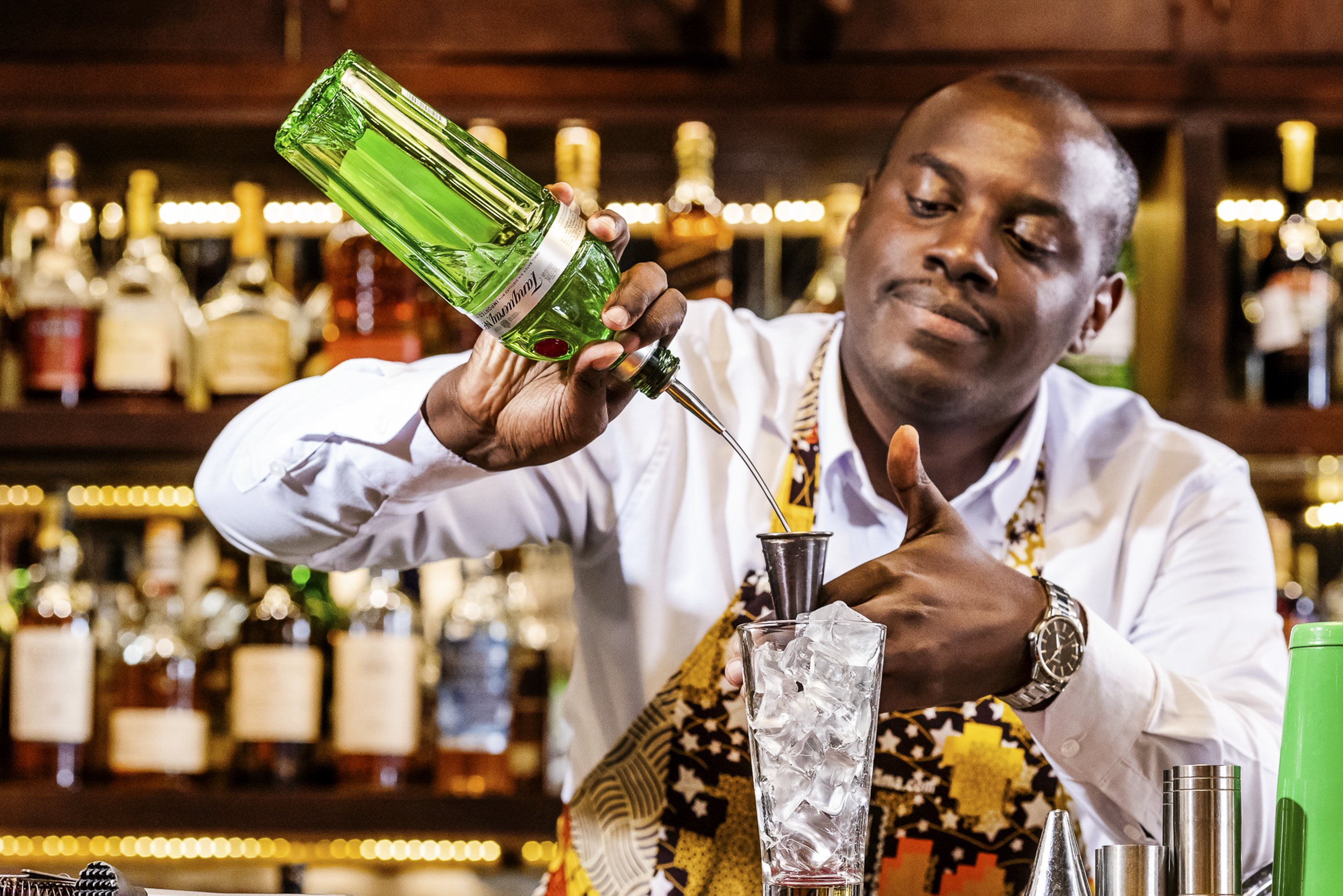 Lifestyle photo of Bartender making a drink