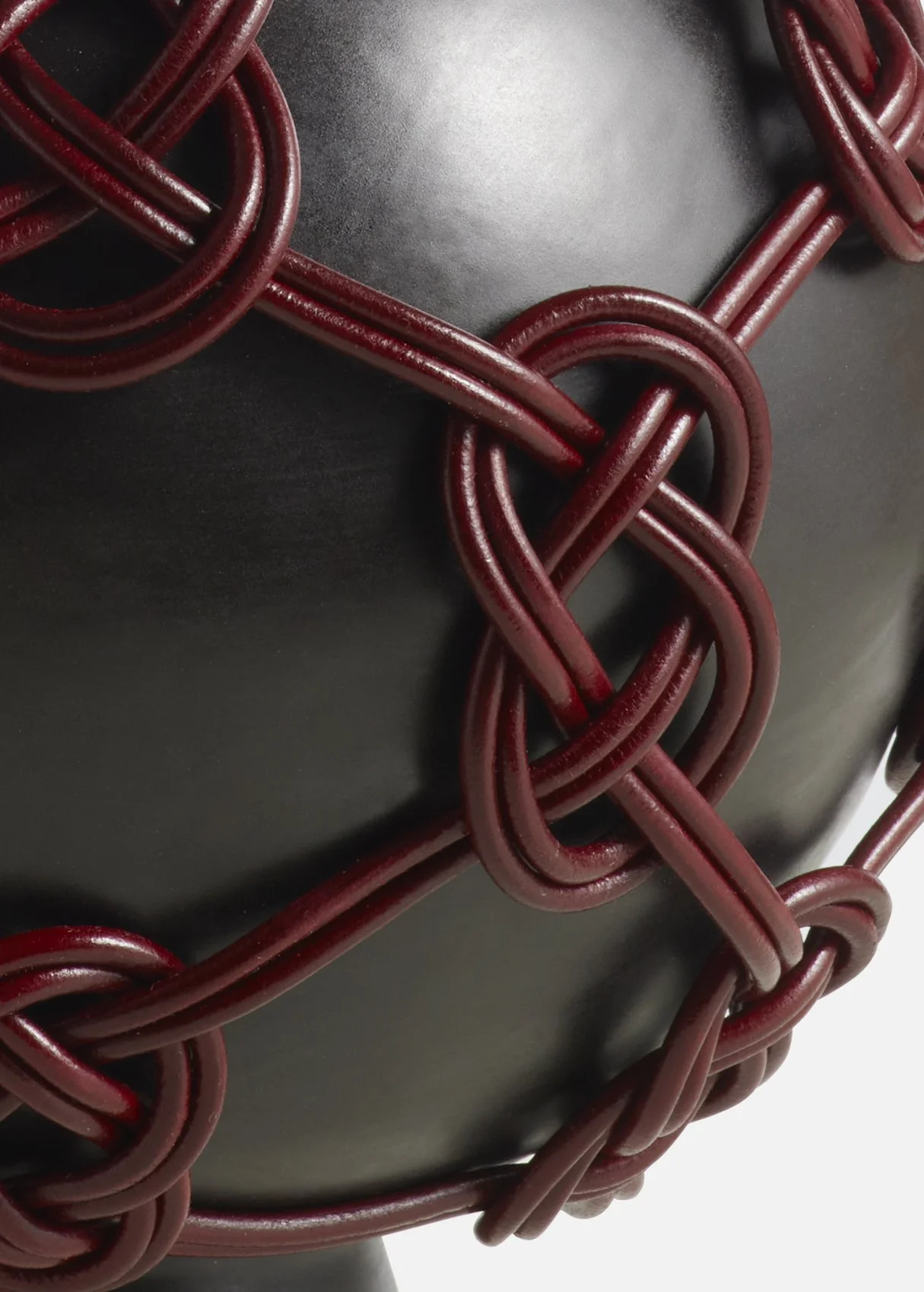 Aimee Betts_Black_Orb_Lamp_Oxblood_Leather_Detail HR.jpg