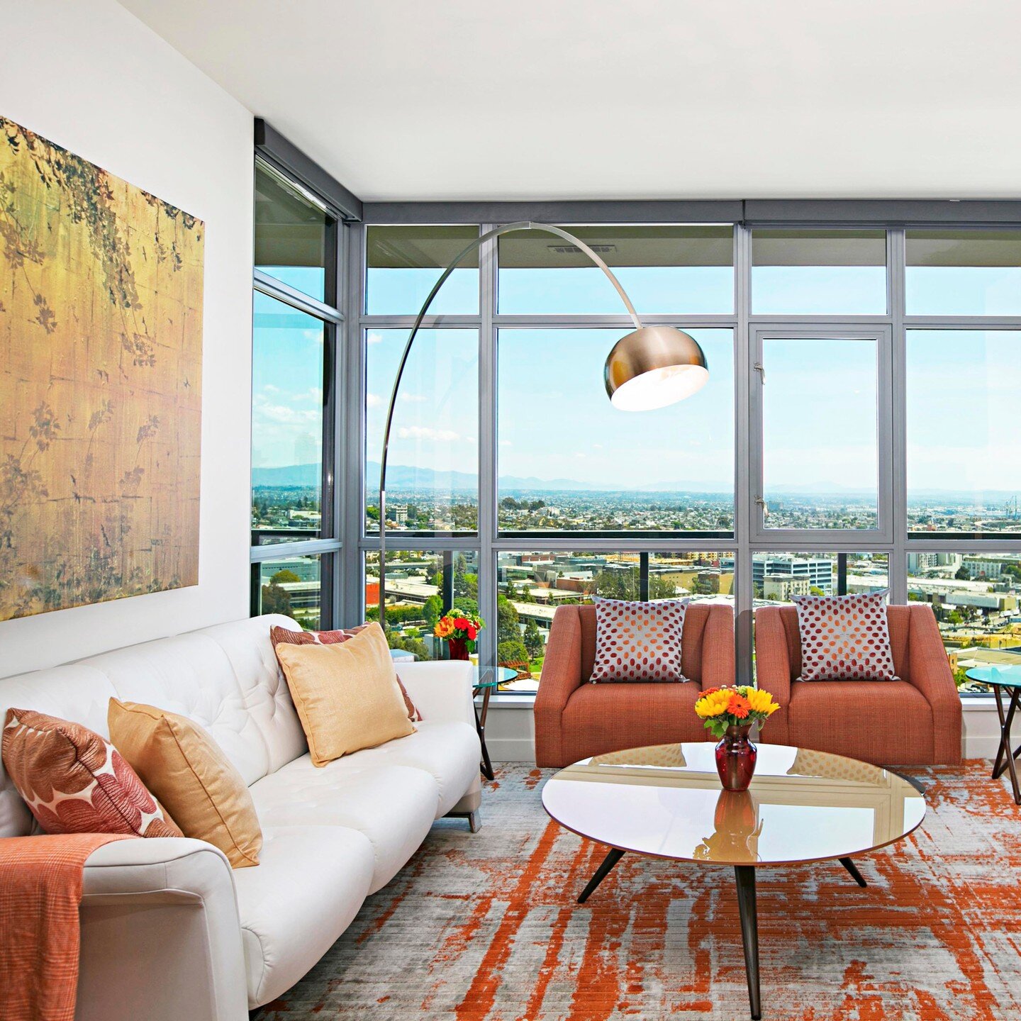 This San Diego loft apartment offers spectacular vistas of the city skyline and Balboa Park. It's vivid oranges and yellows bring to life an inviting atmosphere of light and comfort.

Design by SYLVIA BEEZ for M.A.P. INTERIORS

#sandiegohomes #interi