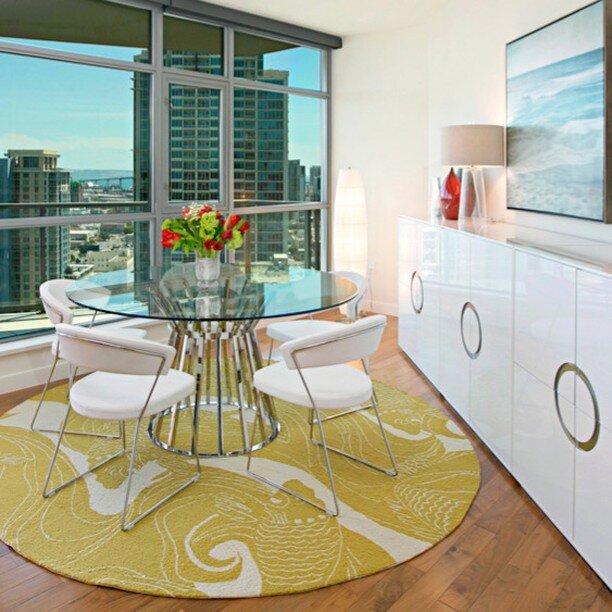 Admiring the mesmerizing skyline of downtown San Diego from this sun-filled loft apartment.

Design by SYLVIA BEEZ for M.A.P. INTERIORS

#downtownsandiego #diningroom #interiordesign #interiorinspiration #loftapartment #architecturaldesign #modernhom