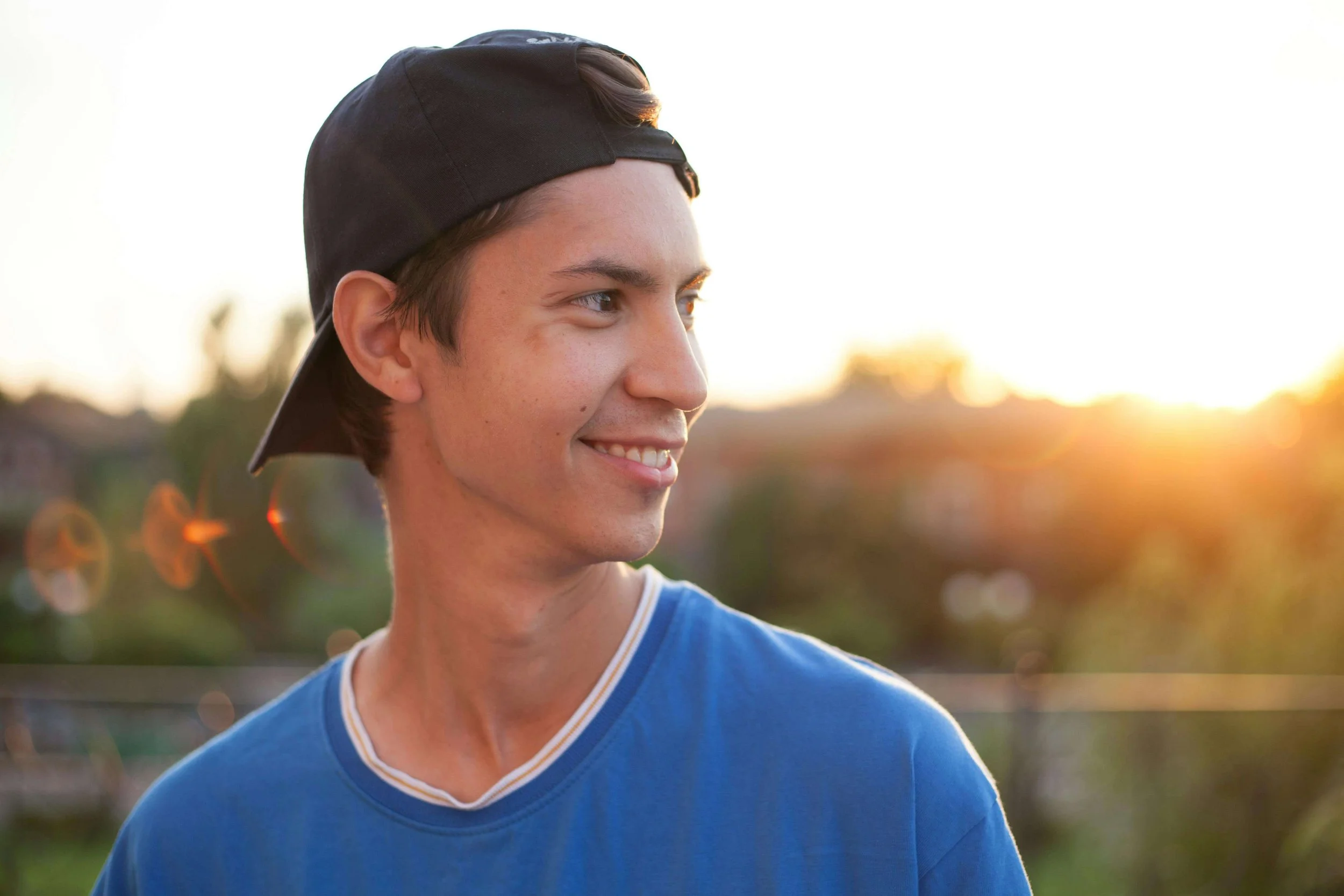 A smiling teen boy wearing a backwards cap. What if your teen could move past perfectionism and finally feel proud of who they are? A teen therapist in San Ramon, CA can help them build lasting confidence and self-worth.