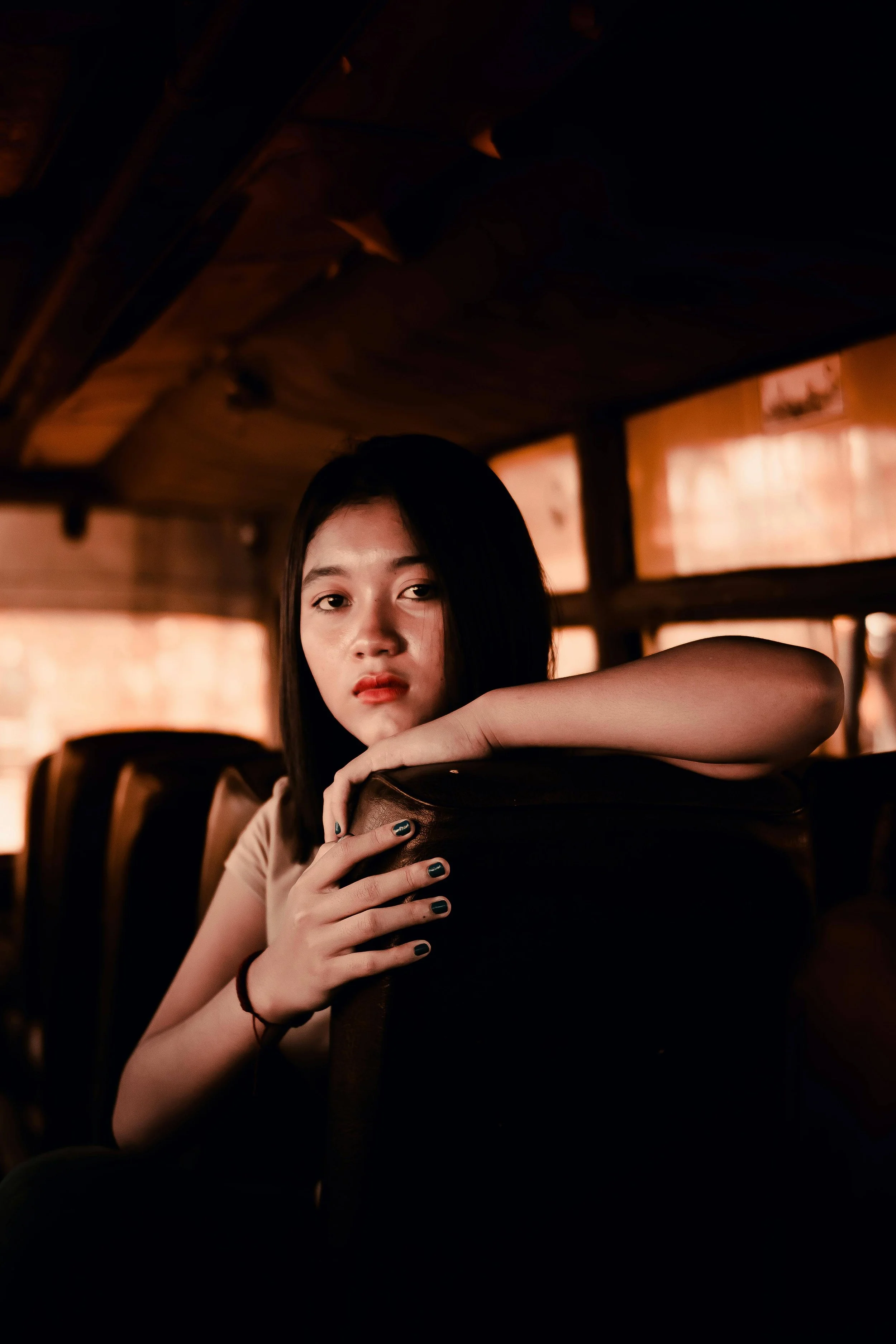 A teen girl sits alone in a dimly lit bus. Is your teen withdrawing socially and showing signs of anxiety that worry you as a parent? A teen therapist in San Ramon, CA, offers practical support for both teens and families.