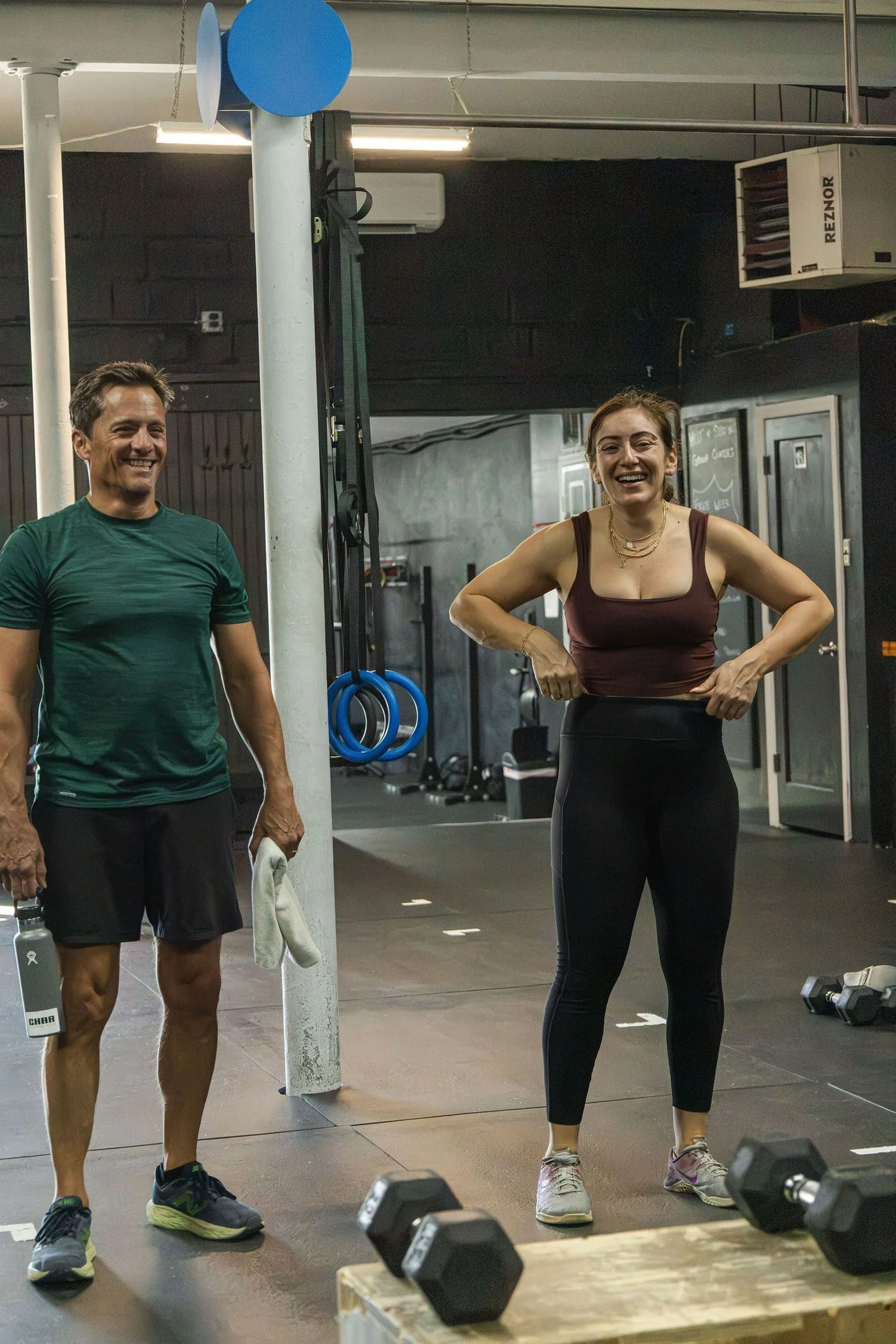 Two smiling Char Fitness Club coaches in Montclair, NJ