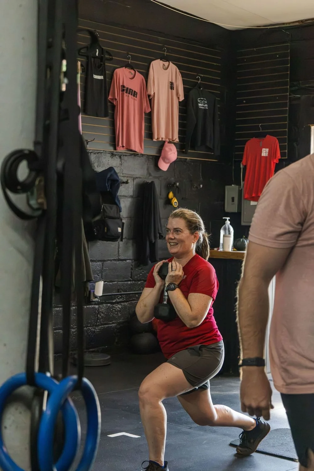 Member training with a kettlebell at Char Fitness Club