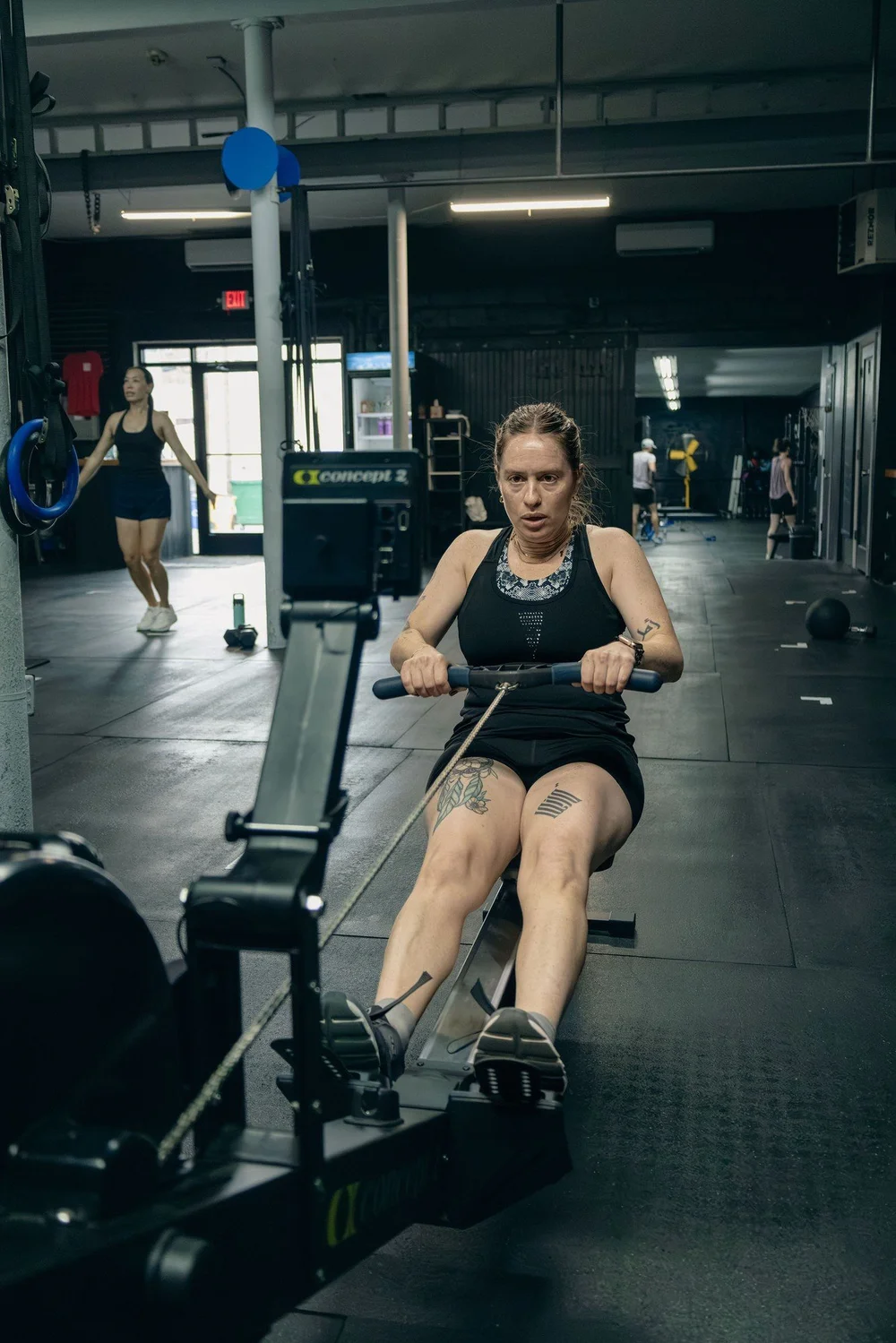 Member rowing during a conditioning class at Char Fitness Club