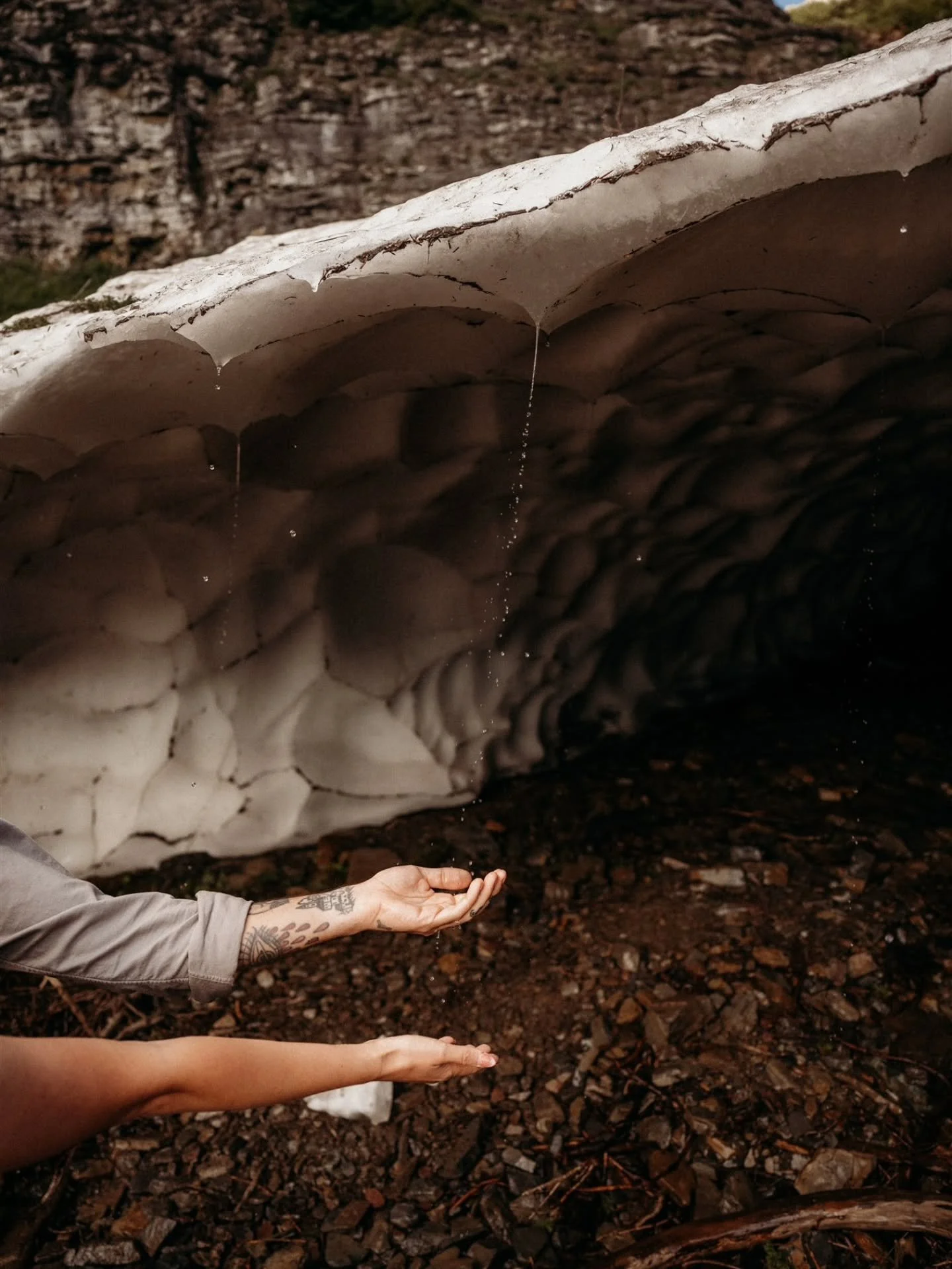 Obviously we don't get under these things, especially when it's actively melting off. BUT it's still badass to be in the presence of nature's magic! 

Love, 
Your fav Glacier National Park Elopement Photographer

#glaciernationalparkelopementphotogra