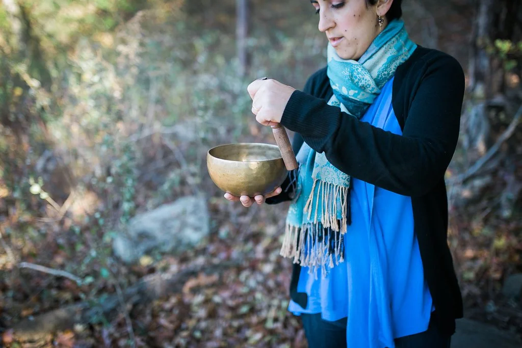 NYC Anxiety therapist Maya plays a Tibetan singing bowl. Women with anxiety in New York City can get therapy here! Try online therapy in New York for anxiety help too!