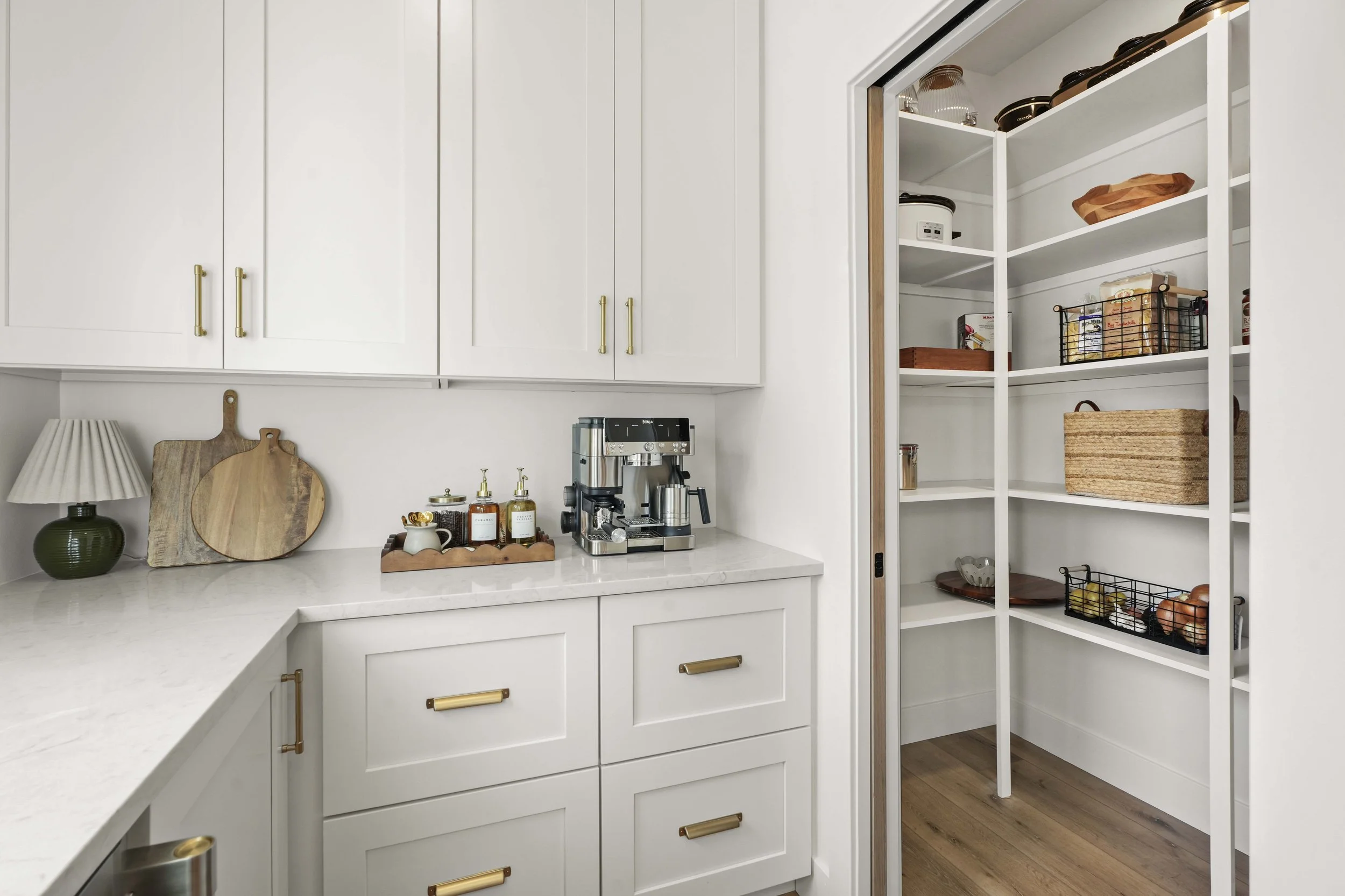 urso-builders-2025-parade-of-homes-gallery-kitchen-pantry.jpg