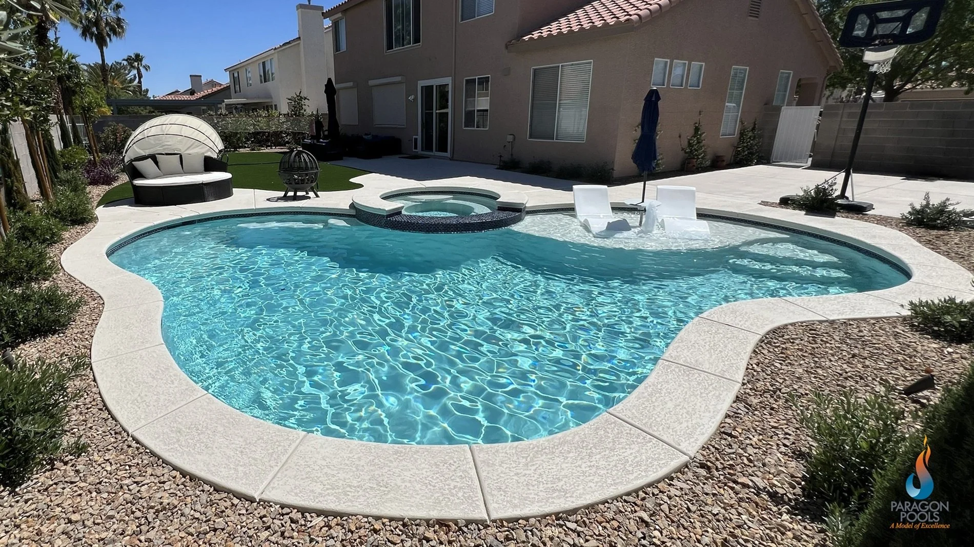 Custom Freeform Swimming Pool and Spa  with a wet deck.