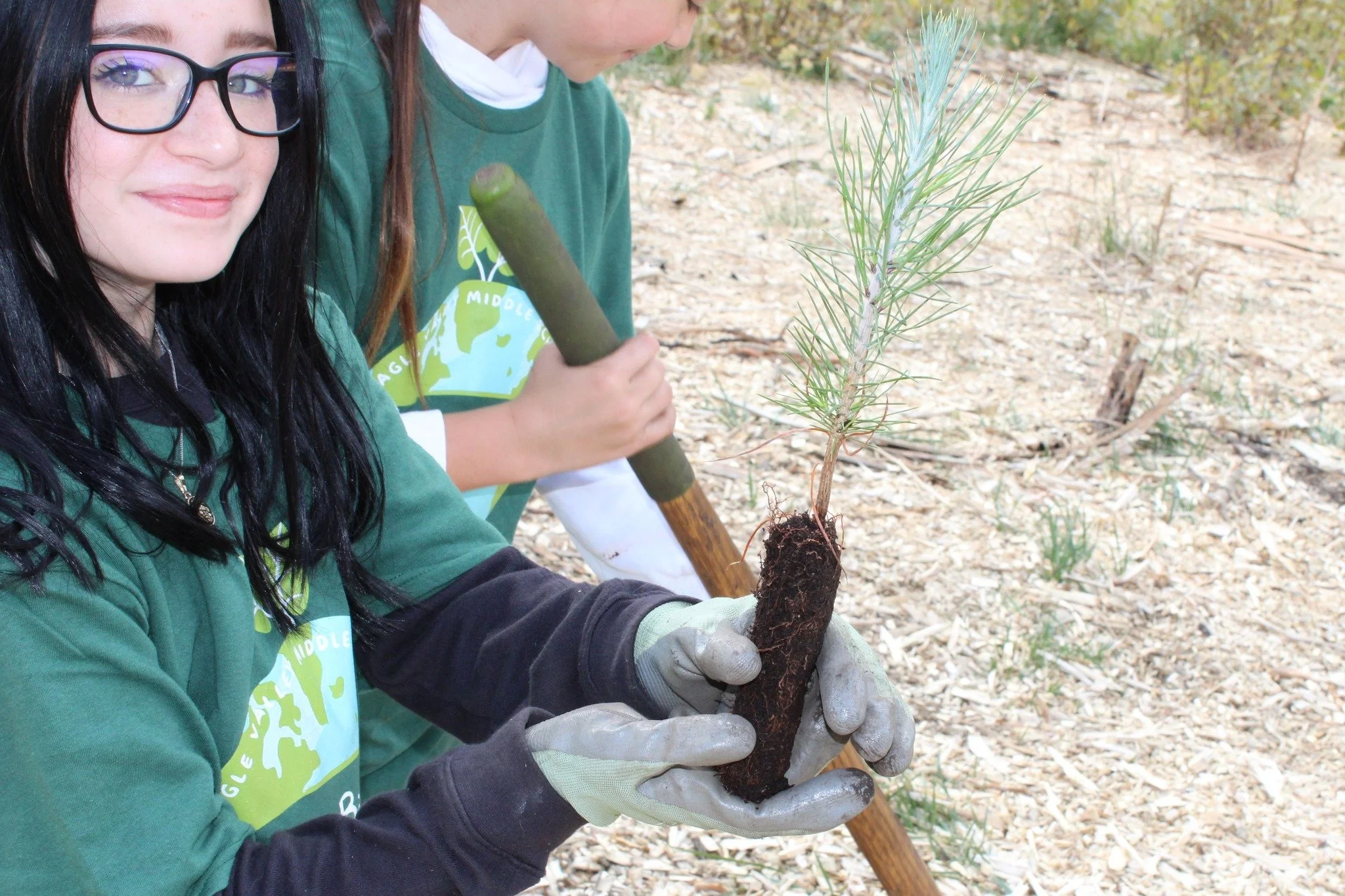 Eagle Valley student with plant.jpg