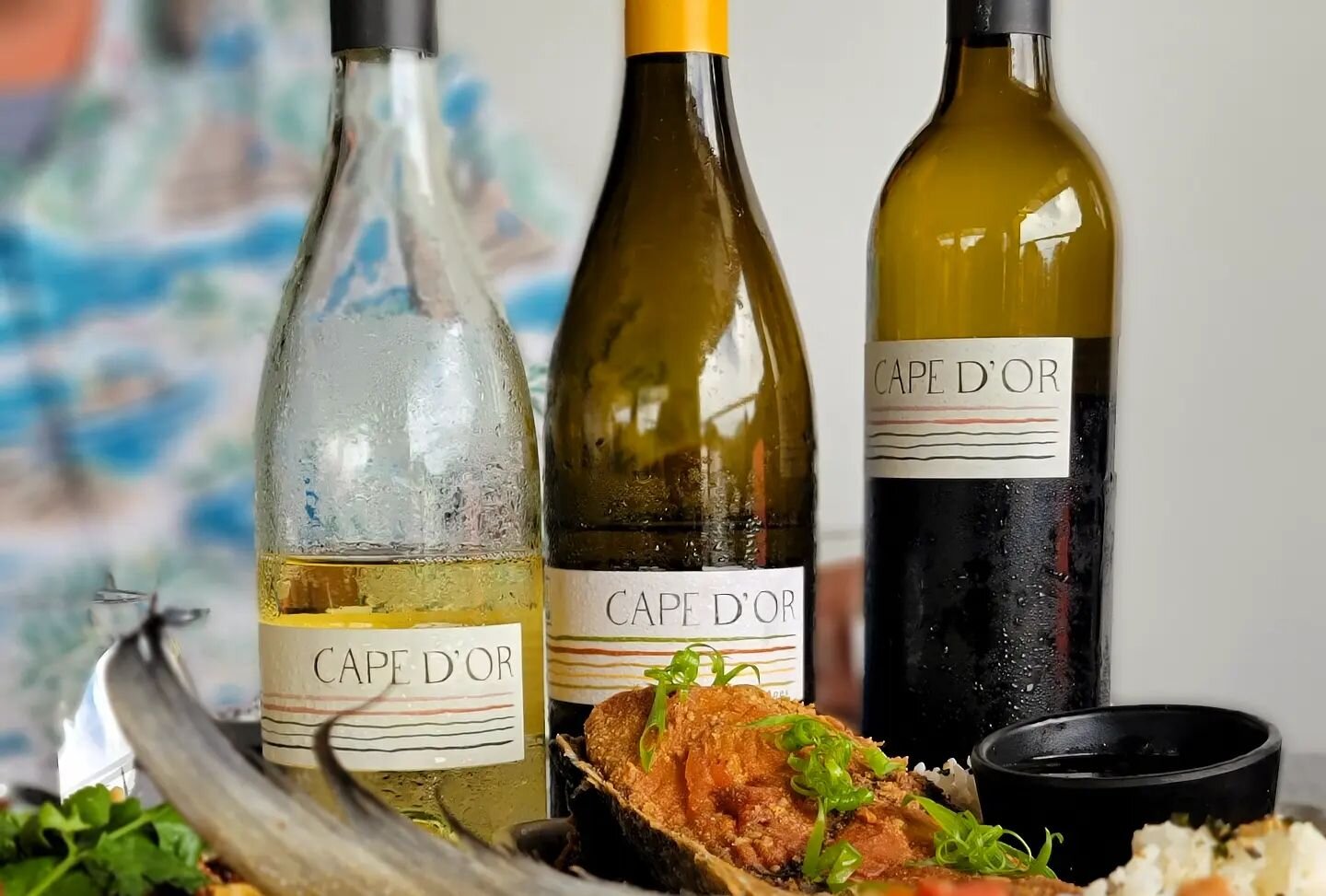 Fused a little bit of South Africa with Hawai'i. In case you were wondering- yes, South African Sauvignon Blanc and Chenin Blanc goes well with Ahi Collar and whole fried fish. @cape_dor_wines