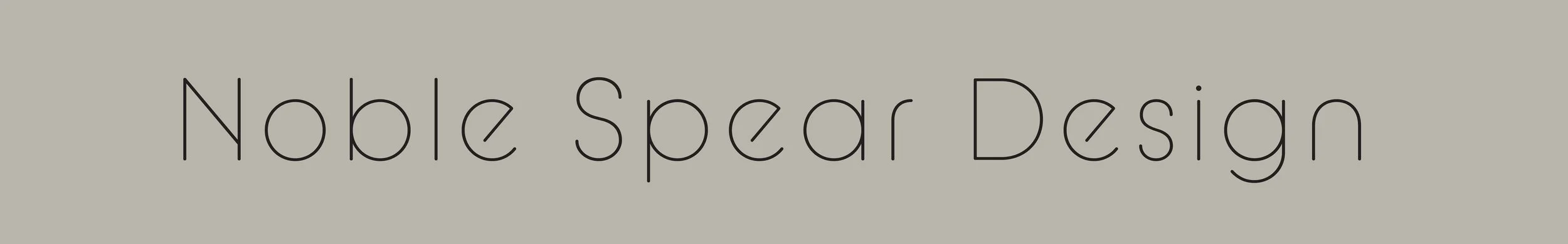 Text reading 'Noble Spear Design' on a light gray background.