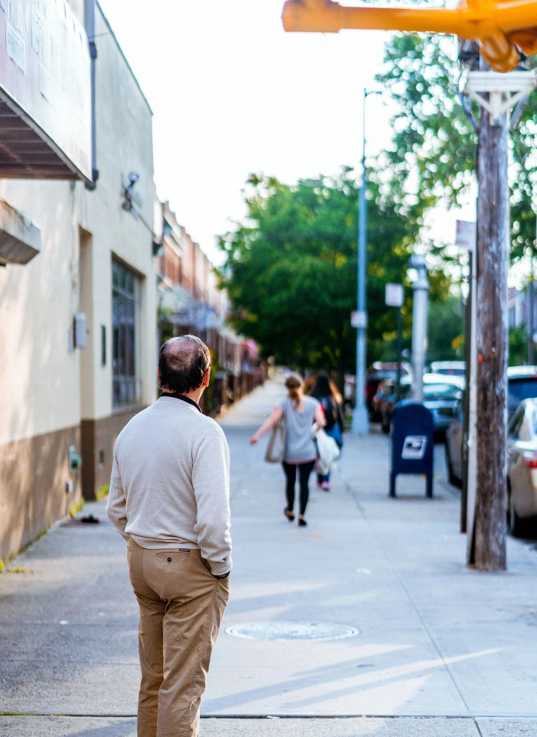 image of person from behind watching someone else walk away divorce therapy Michigan