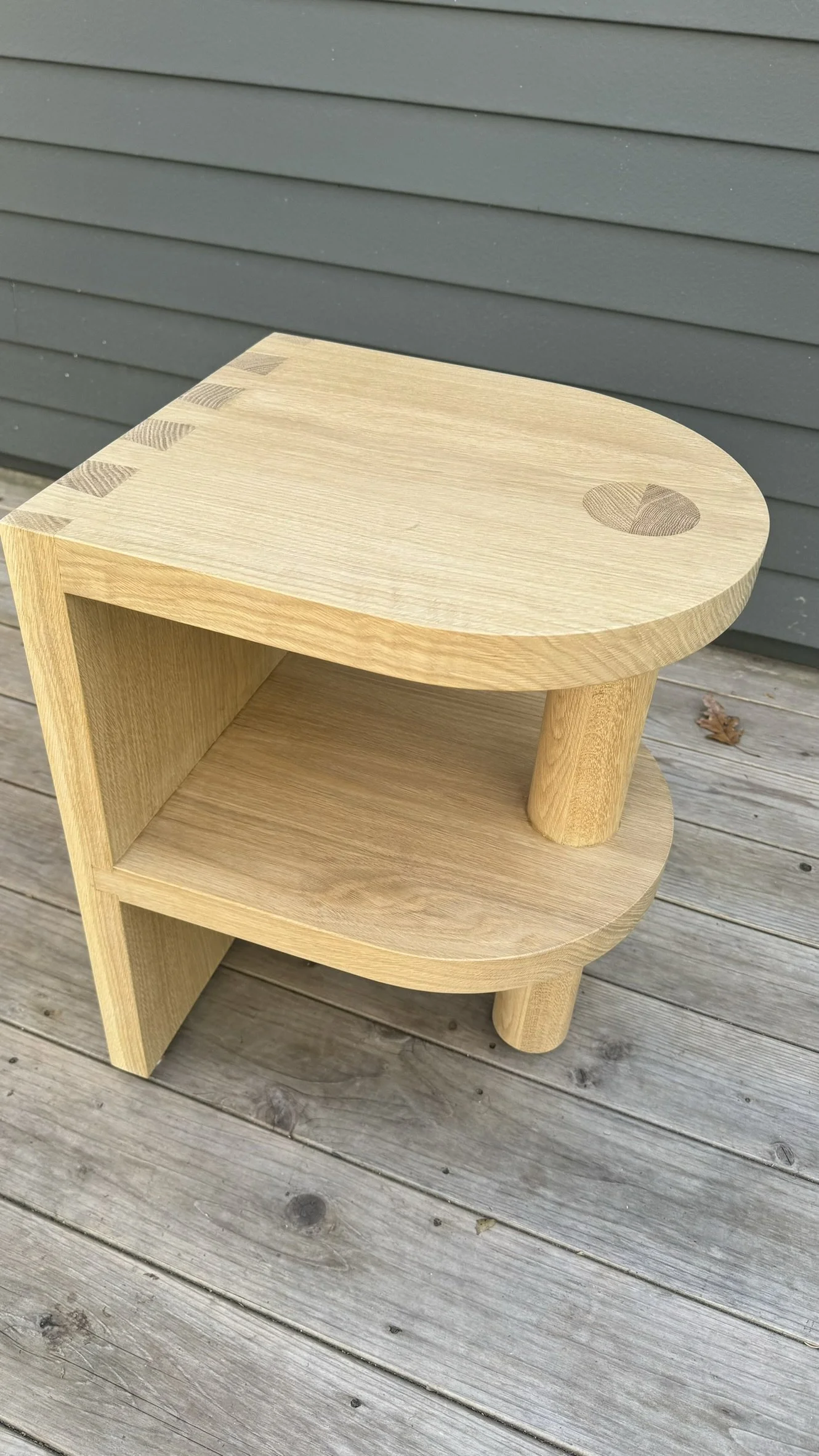 Sliding dovetail on lower shelf