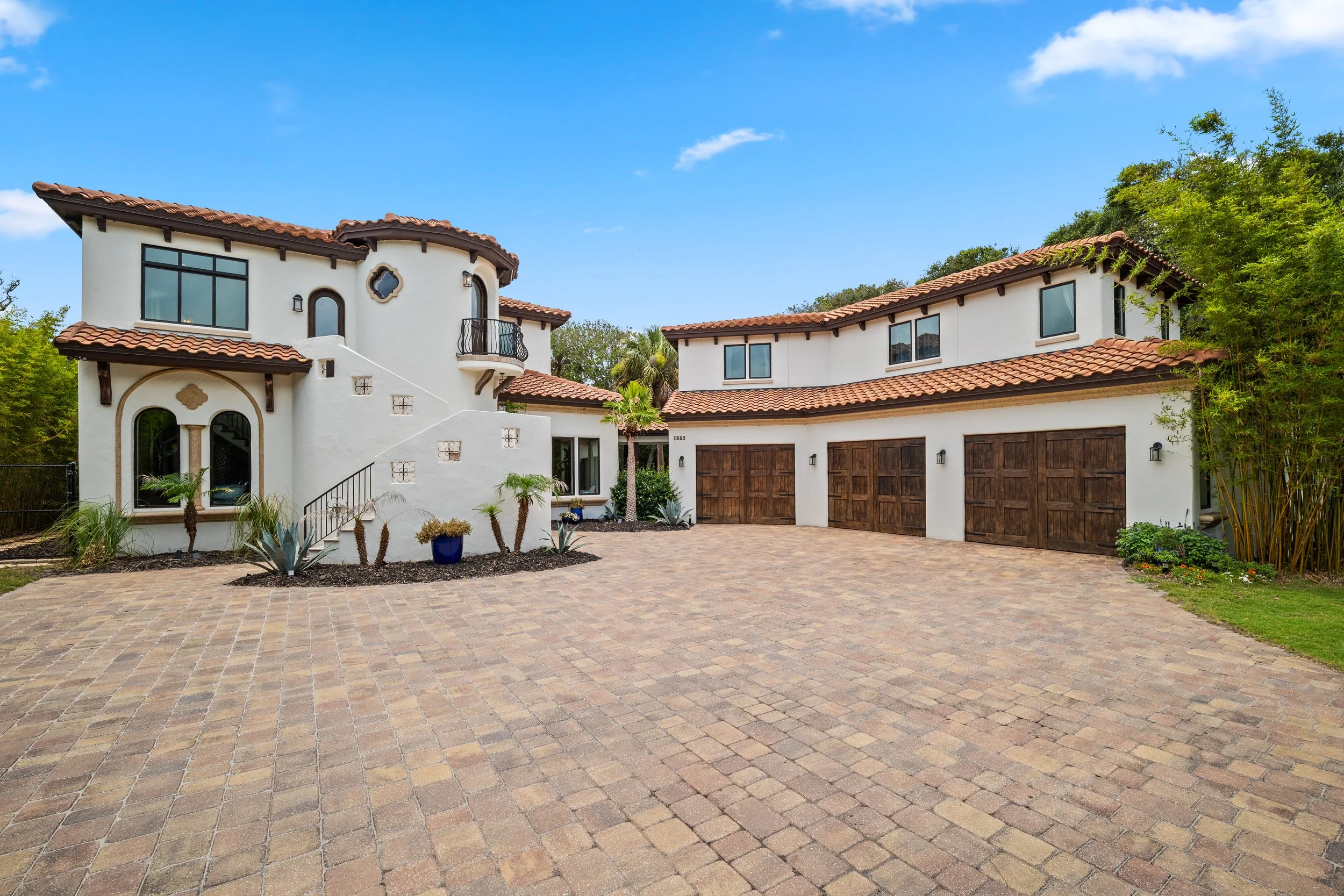 Mediterranean-style mansion with a paver courtyard and three-car garage, Ponte Vedra Beach, FL.