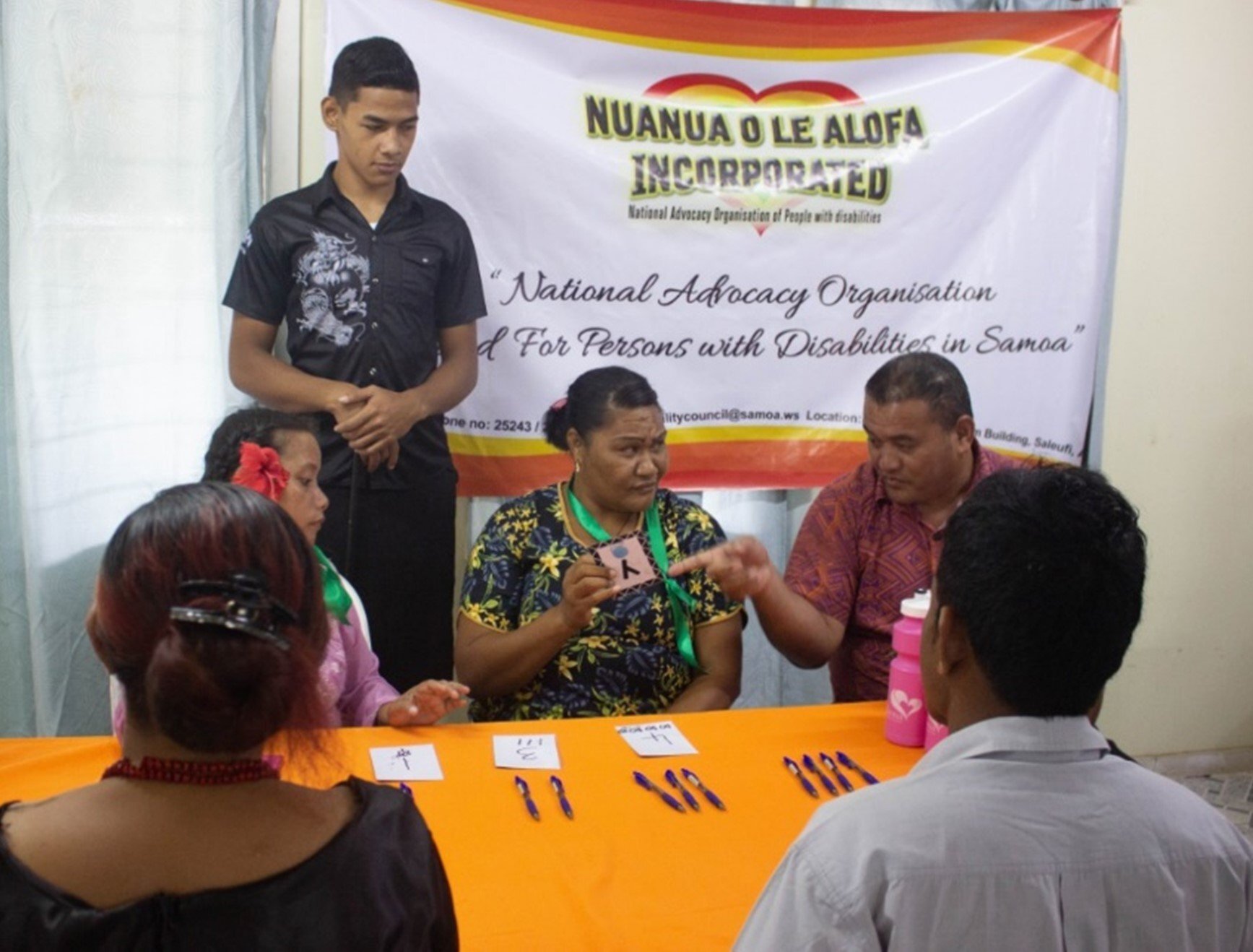 I saw videos of people in masks and people dying, but I don't know what it  means”: supporting Samoa's Deaf community through COVID-19
